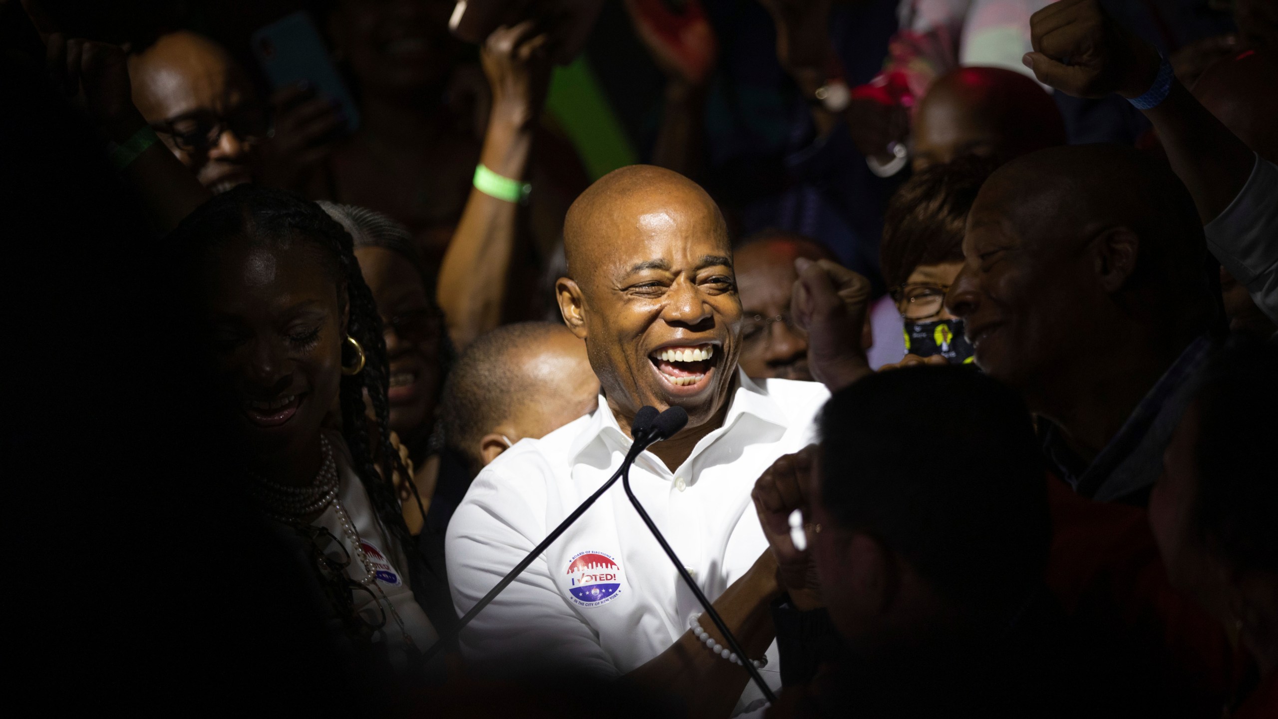 Mayoral candidate Eric Adams mingles with supporters during his election night party, late Tuesday, June 22, 2021, in New York. (AP Photo/Kevin Hagen)