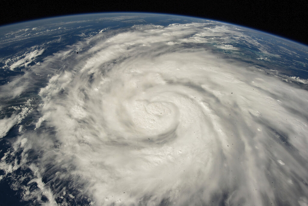 This Satellite image provided by NASA on Sept. 26, 2022, shows Hurricane Ian pictured from the International Space Station just south of Cuba gaining strength and heading toward Florida. Hurricane Ian rapidly intensified off Florida's southwest coast Wednesday, Sept. 28, gaining top winds of 155 mph (250 kph), just shy of the most dangerous Category 5 status. Image Courtesy of This Satellite image provided by NASA on Sept. 26, 2022, shows Hurricane Ian pictured from the International Space Station just south of Cuba gaining strength and heading toward Florida. Hurricane Ian rapidly intensified off Florida's southwest coast Wednesday, Sept. 28, gaining top winds of 155 mph (250 kph), just shy of the most dangerous Category 5 status. Image courtesy of This Satellite image provided by NASA on Sept. 26, 2022, shows Hurricane Ian pictured from the International Space Station just south of Cuba gaining strength and heading toward Florida. Hurricane Ian rapidly intensified off Florida's southwest coast Wednesday, Sept. 28, gaining top winds of 155 mph (250 kph), just shy of the most dangerous Category 5 status.