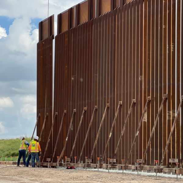 A picture of a construction crew working on a border wall in Texas.