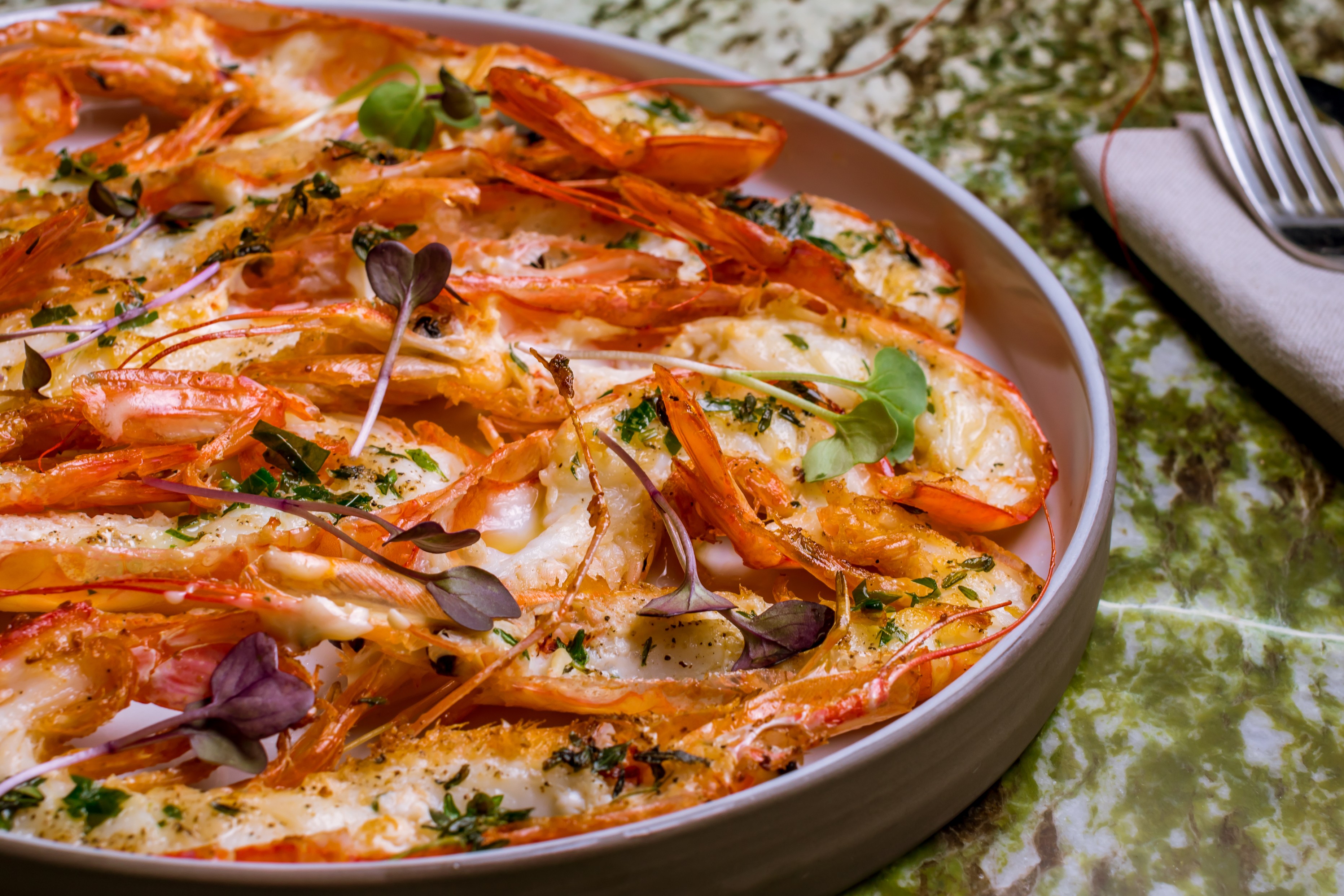 Cooked langoustines on a plate (Getty Images)