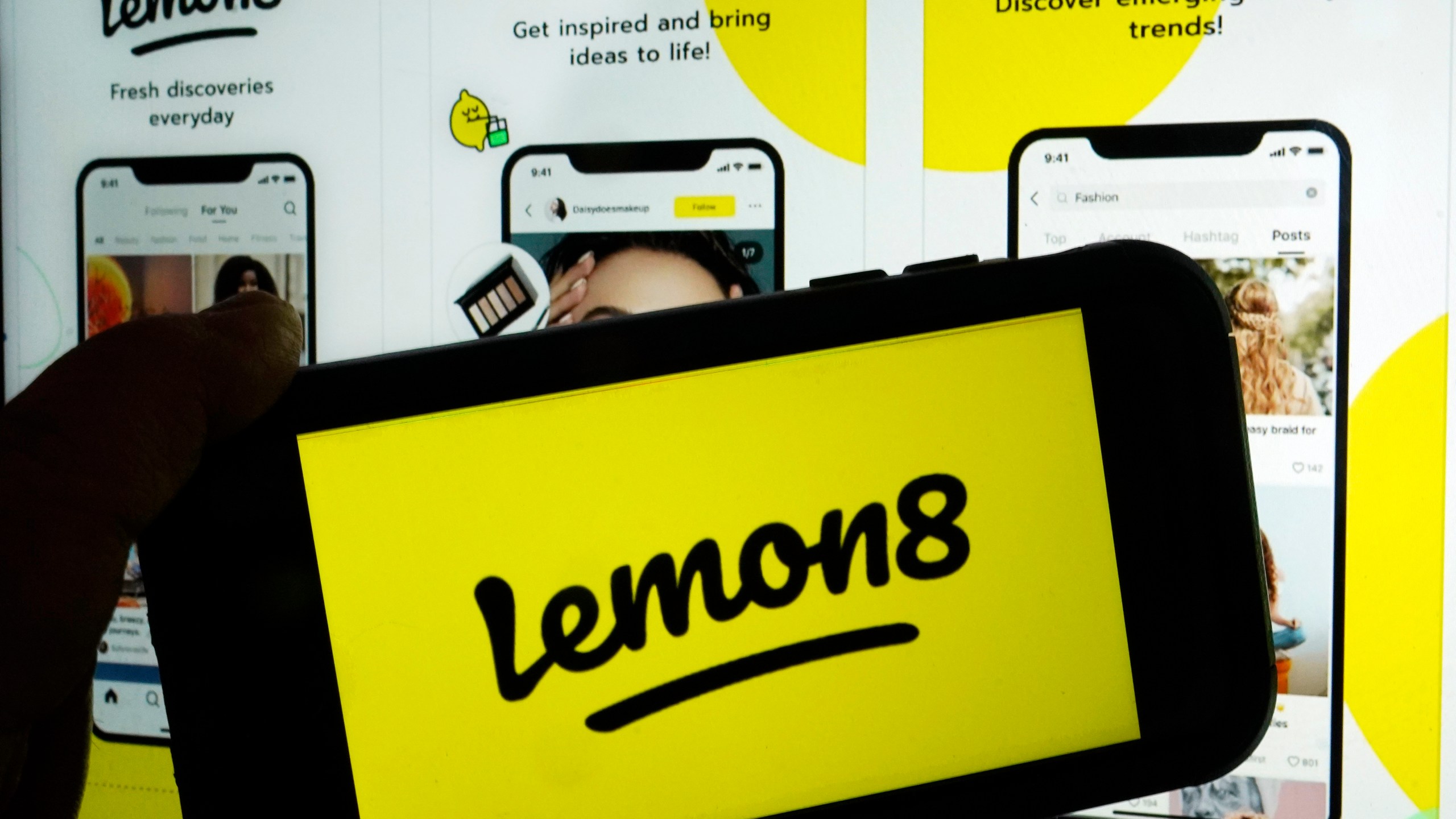 This photo shows the logo and application page for the social media site Lemon8, in New York, Wednesday, April 5, 2023. Lemon8, is a photo-based app that could be described as a mixture of Instagram and Pinterest with sprinkles of videos that resemble those posted on TikTok. It launched in Asian markets in 2020 and has already made headway in countries like Thailand and Japan. (AP Photo/Richard Drew)