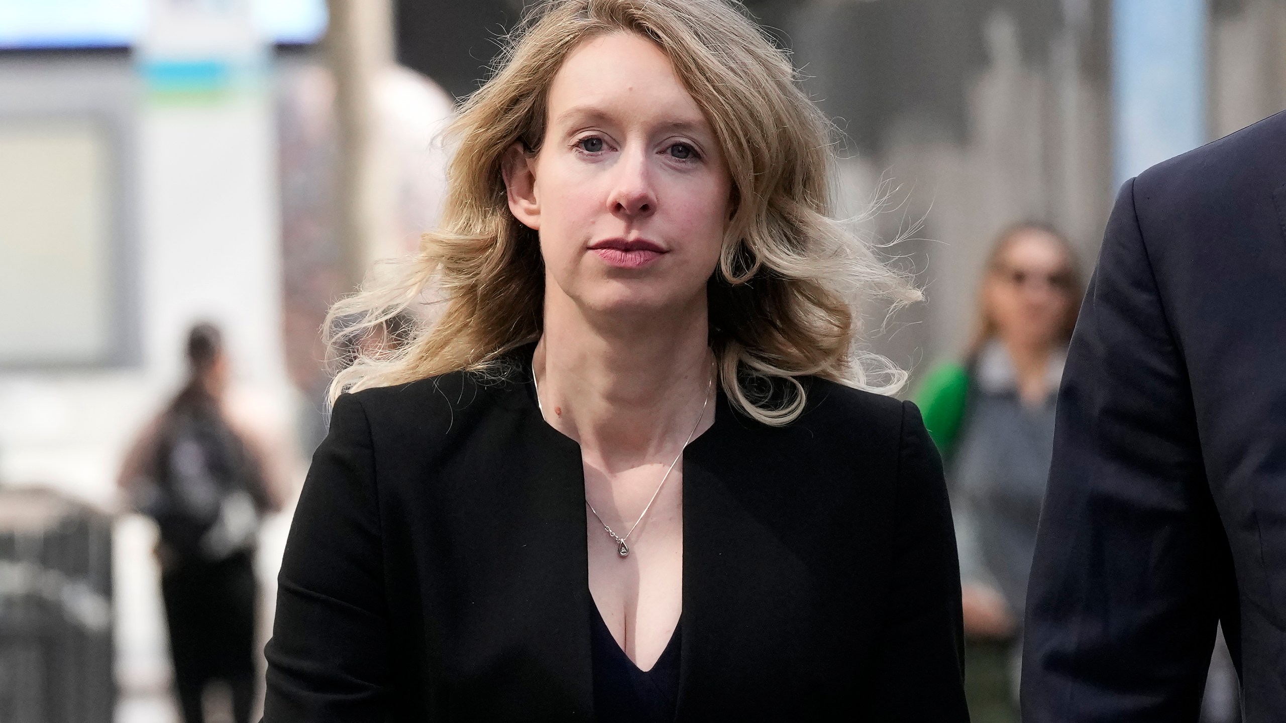 FILE - Former Theranos CEO Elizabeth Holmes leaves federal court in San Jose, Calif., March 17, 2023. On Monday, April 10, Holmes was rebuffed in her attempt to stay out of federal prison while she appeals her conviction for the fraud she committed while overseeing a blood-testing scam that exposed Silicon Valley’s dark side. (AP Photo/Jeff Chiu, File)