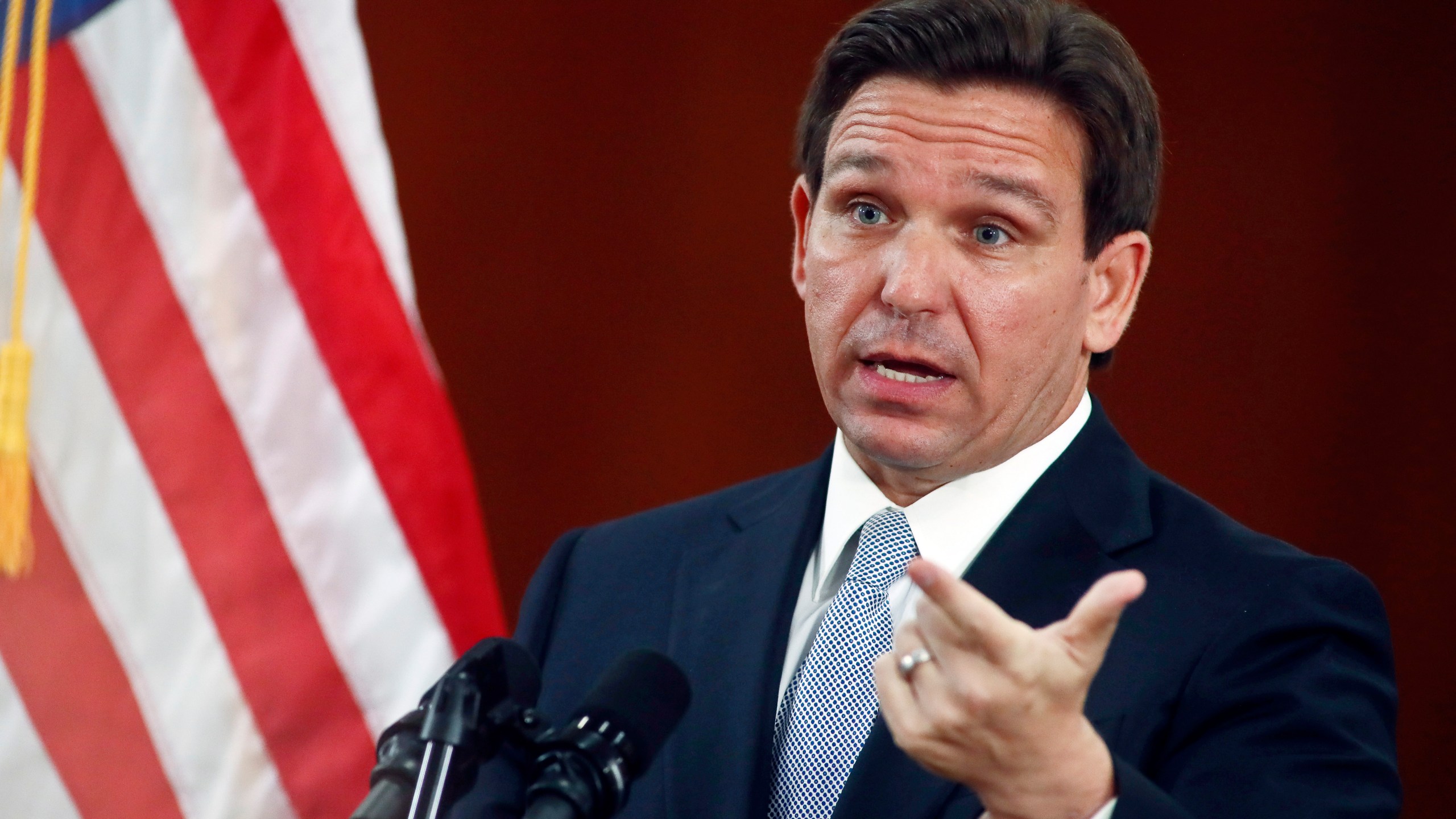 FILE - Florida Gov. Ron DeSantis answers questions from the media in the Florida Cabinet following his State of the State address during a joint session of the Senate and House of Representatives on March 7, 2023, at the state Capitol in Tallahassee, Fla. The Republican-dominated Florida Legislature on Thursday, April 13, approved a ban on abortions after six weeks of pregnancy, a proposal supported by DeSantis as he prepares for an expected presidential run. (AP Photo/Phil Sears, File)