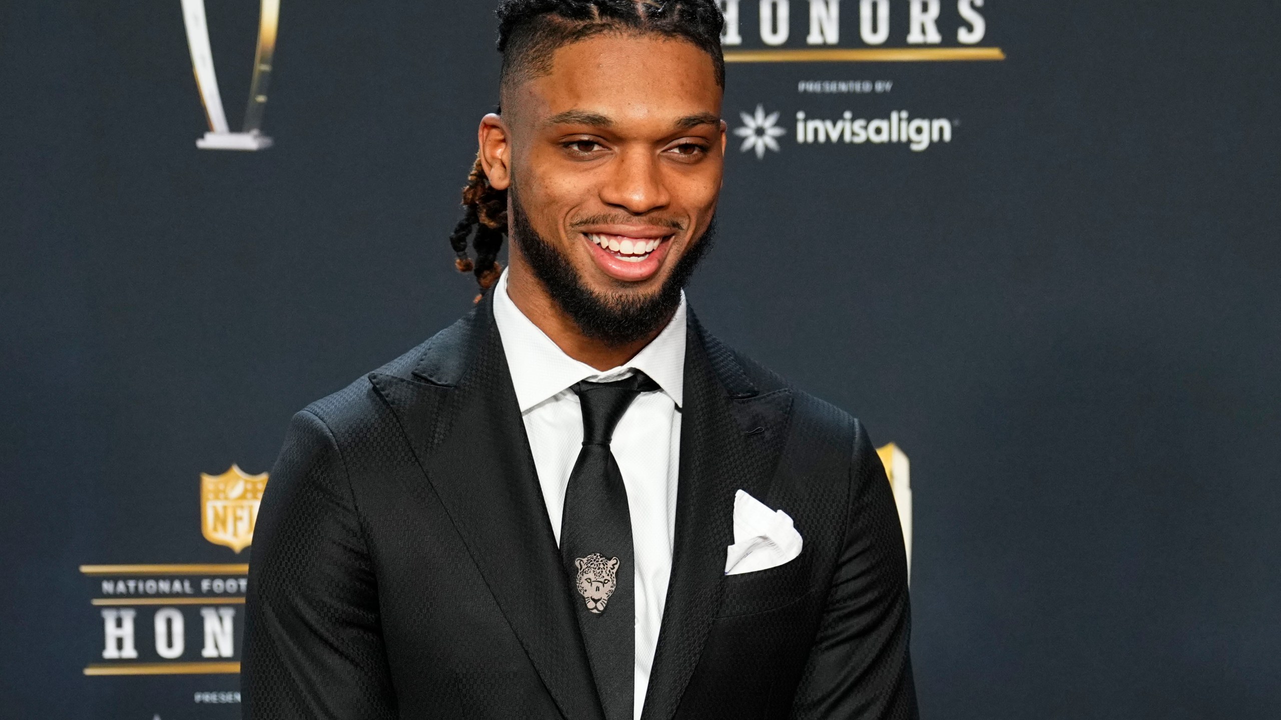 FILE - Buffalo Bills Damar Hamlin arrives for the NFL Honors award show ahead of the Super Bowl 57 football game, Thursday, Feb. 9, 2023, in Phoenix. Hamlin has been cleared to resume playing and is attending the team’s voluntary workout program some four months after going into cardiac arrest and having to be resuscitated on the field during a game at Cincinnati, general manager Brandon Beane said Tuesday, April 18, 2023. (AP Photo/Matt York, File)