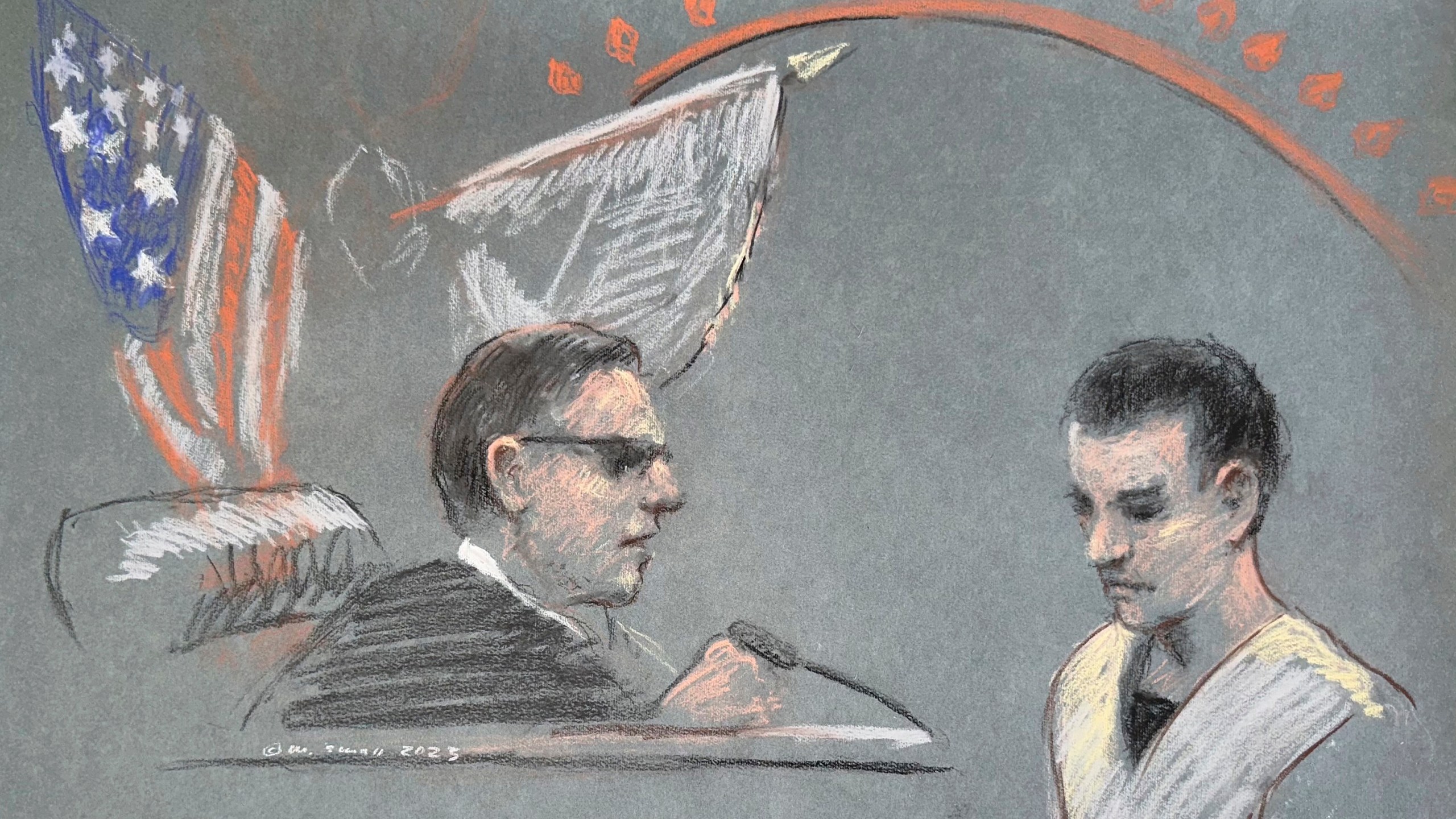 Massachusetts Air National Guardsman Jack Teixeira, right, appears in U.S. District Court in Boston, Friday, April 14, 2023. He is accused in the leak of highly classified military documents as prosecutors unsealed charges and revealed how billing records and interviews with social media comrades helped pinpoint Teixeira. (Margaret Small via AP)