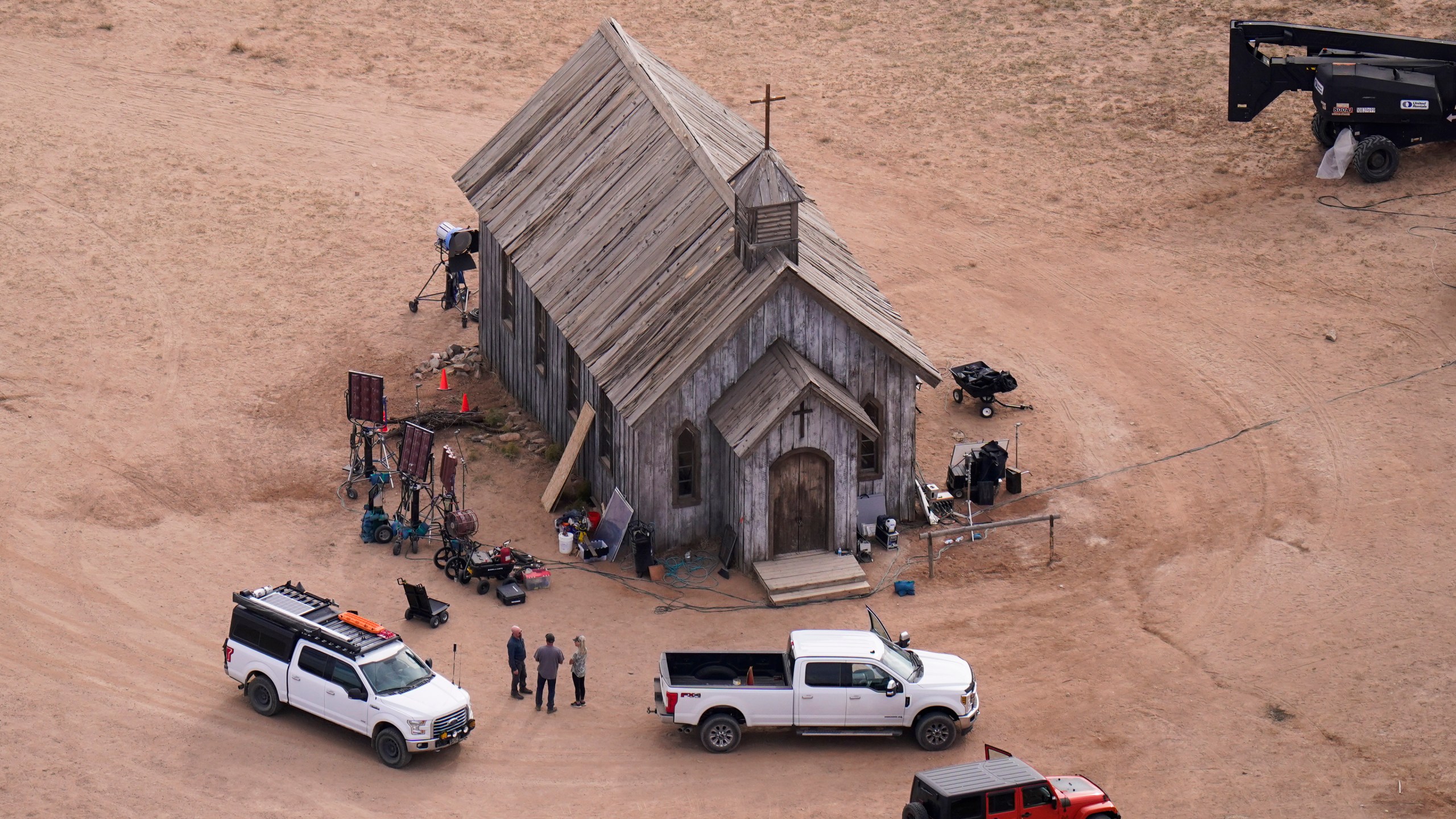 FILE - This aerial photo shows the movie set of "Rust" at Bonanza Creek Ranch in Santa Fe, N.M., on Saturday, Oct. 23, 2021. Filming on the Western movie "Rust" is scheduled to resume at a movie ranch in Montana in the aftermath of the fatal shooting of a cinematographer by actor Alec Baldwin during a rehearsal on the original production in New Mexico. (AP Photo/Jae C. Hong, File)