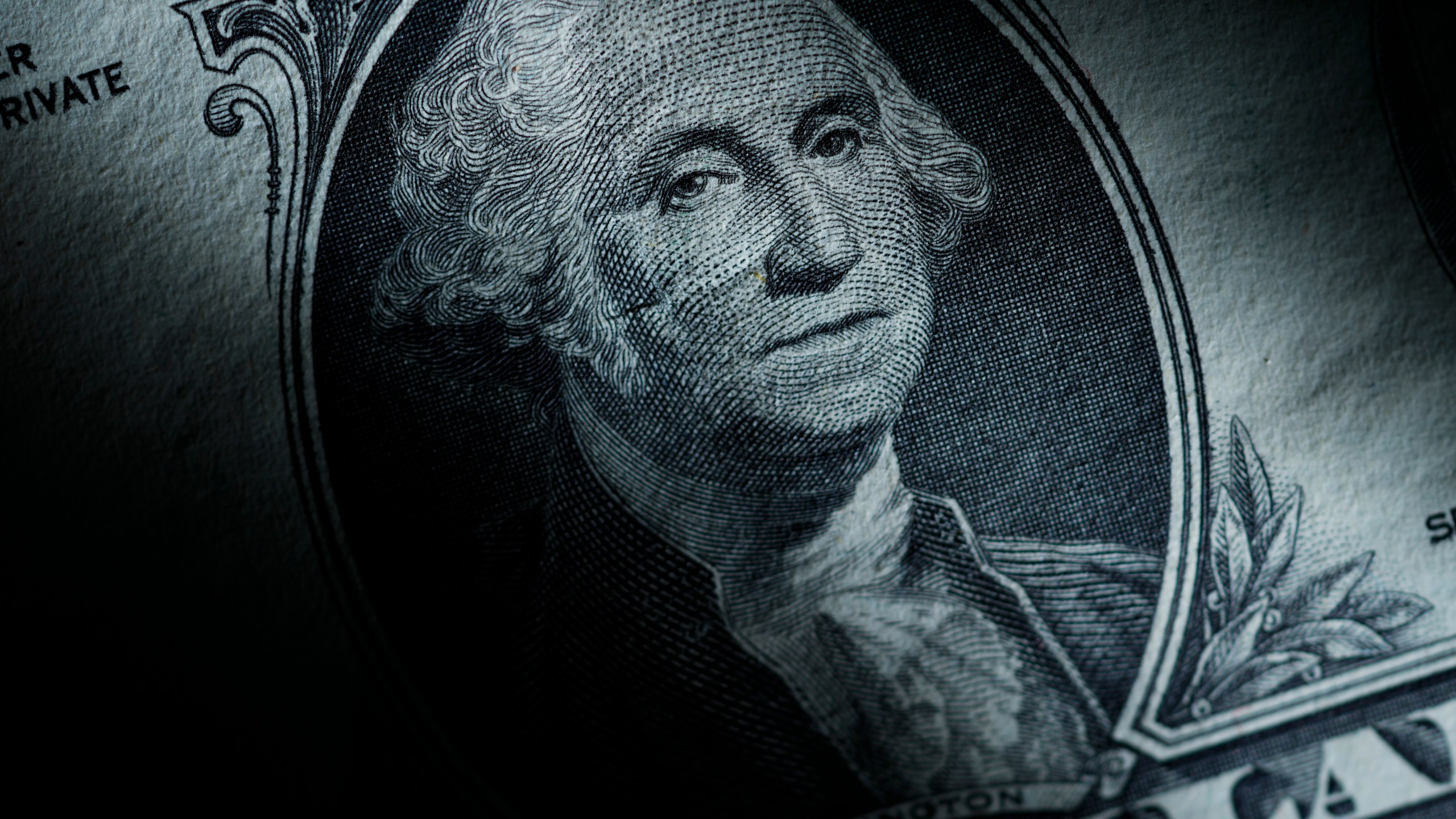 The likeness of George Washington is seen on a U.S. one dollar bill, Monday, March 13, 2023, in Marple Township, Pa. After years of paying low rates for savers, banks are finally offering better interest on deposits. Moving your savings around by opening a new account and closing an old one can seem like a hassle, but it's a use of time that can pay off. (AP Photo/Matt Slocum)