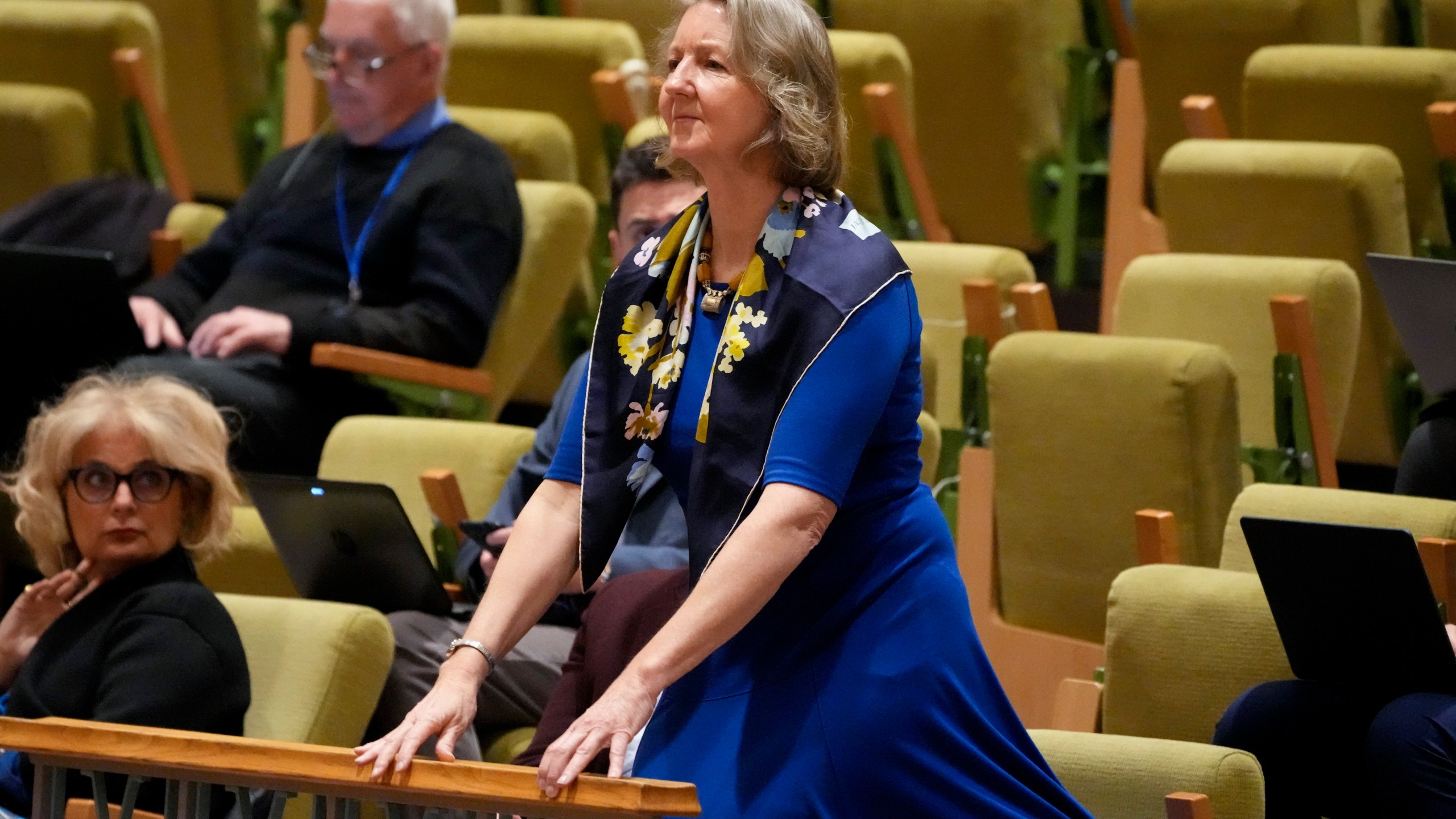 Elizabeth Whelan, the sister of Paul Whelan, an American who has been detained in Russia for more than four years, stands in the gallery upon request from current speaker Linda Thomas-Greenfield, United States Ambassador to the United Nations, during a meeting of the U.N. Security Council headed by Russia's foreign minister Sergey Lavrov, serving as president of the council, Monday, April 24, 2023, at United Nations headquarters. (AP Photo/John Minchillo)