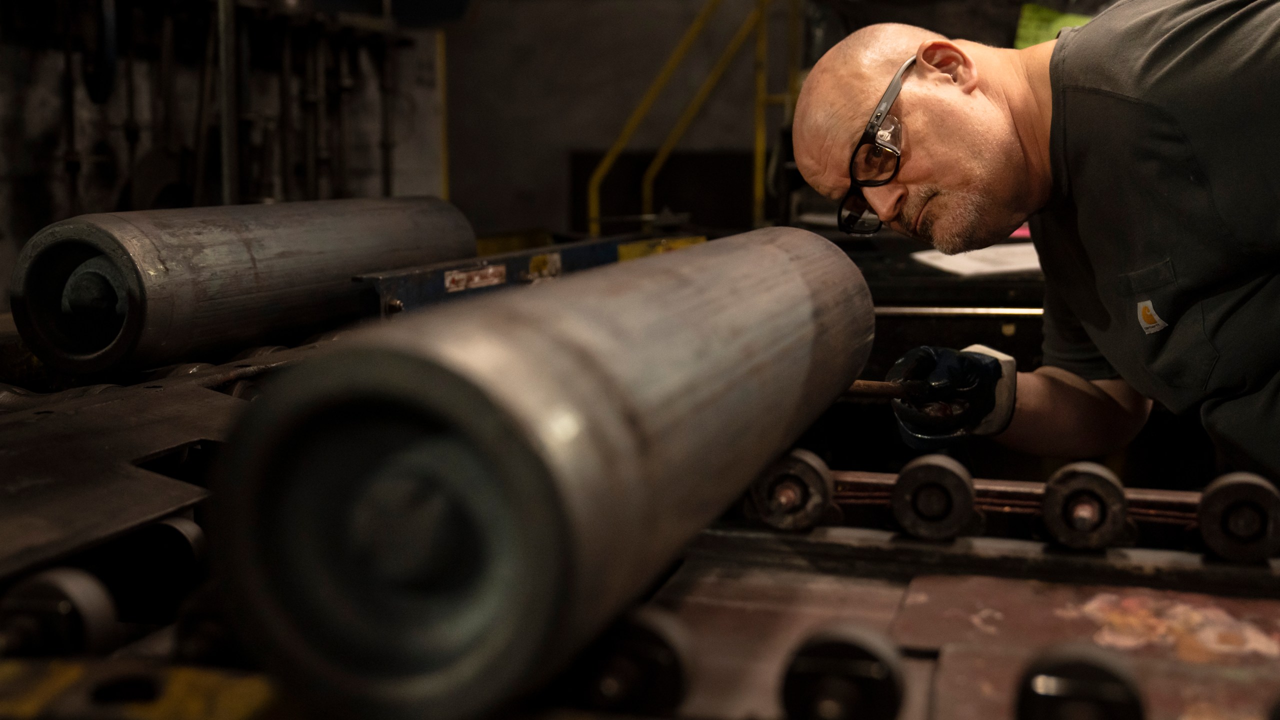 File - A steel worker inspects a 155 mm M795 artillery projectile during the manufacturing process at the Scranton Army Ammunition Plant in Scranton, Pa., Thursday, April 13, 2023. On Thursday, the Commerce Department issues its first of three estimates of how the U.S. economy performed in the first quarter of 2023. (AP Photo/Matt Rourke, File)