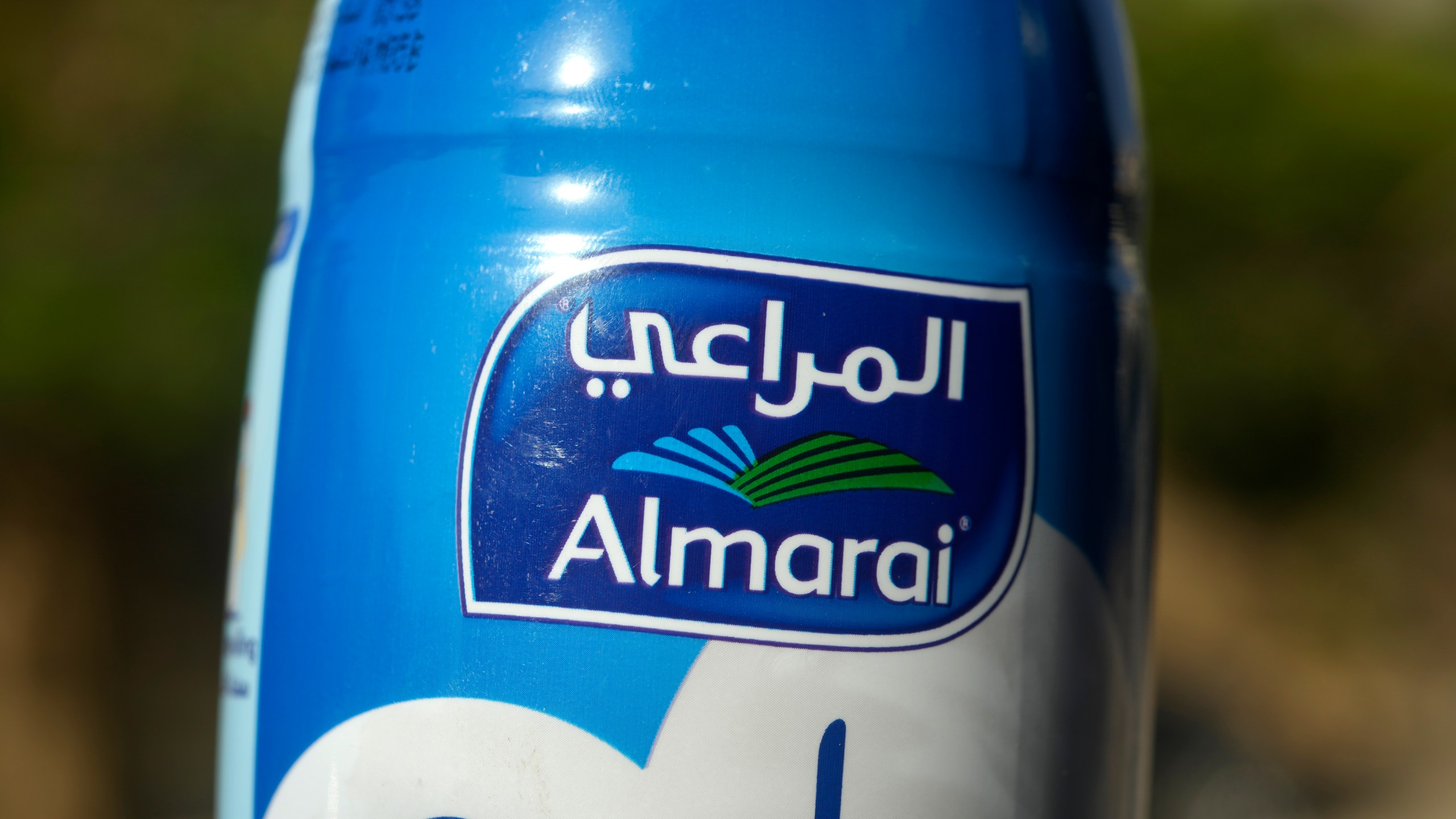 This image shows an Almarai logo in Cairo, Egypt, on Wednesday, April 26, 2023. Fondomonte Arizona, a subsidiary of Almarai Co., has for nearly a decade grown alfalfa in the American Southwest that is sent to the Gulf kingdom to feed cows there. Arizona rescinded a pair of drilling permits that would have allowed Fondomonte to pump up to 3,000 gallons of water per minute to irrigate its forage crops. (AP Photo/Amr Nabil)