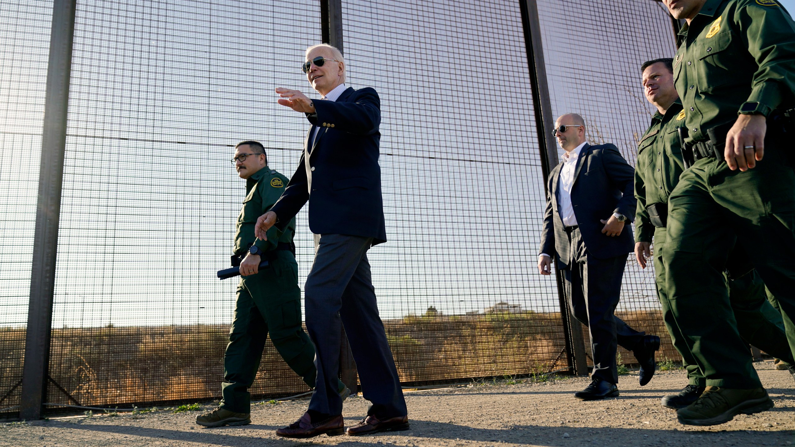 FILE - President Joe Biden walks along a stretch of the U.S.-Mexico border in El Paso Texas, Jan. 8, 2023. The Biden administration has requested 1,500 troops for the U.S.-Mexico border amid an expected migrant surge following the end of pandemic-era restrictions. (AP Photo/Andrew Harnik, File)