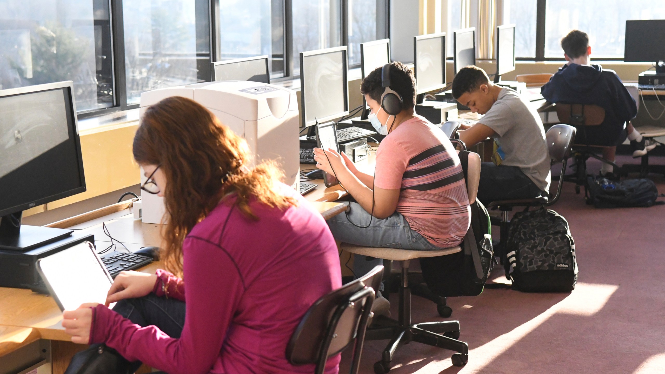 FILE - Students work in the library during homeroom at D.H.H. Lengel Middle School in Pottsville, Pa., on March 15, 2022. Test scores in history and civics have declined slightly for eighth-grade students in the U.S., according to results that show an increasing number of children lack a basic understanding in either subject, according to the the National Assessment of Educational Progress, Wednesday, May 3, 2023. (Lindsey Shuey/Republican-Herald via AP, File)