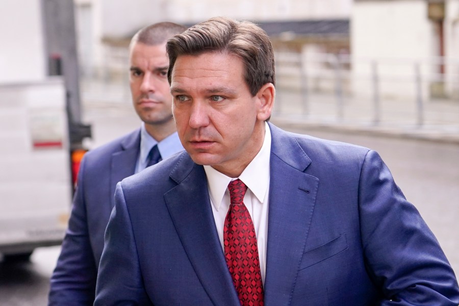 FILE - Florida Republican Gov. Ron DeSantis arrives at the Foreign Office to visit Britain's Foreign Secretary in London, Friday, April 28, 2023. DeSantis is slated to headline Iowa Rep. Randy Feenstra’s annual summer fundraiser in northwest Iowa on May 13 and is expected to speak at a party fundraiser later that evening in Cedar Rapids. A campaign official for former President Donald Trump said Saturday, April 29, that the former president now plans to be in Iowa on the same day to headline an organizing rally at a sprawling park in downtown Des Moines. (AP Photo/Alberto Pezzali, File)