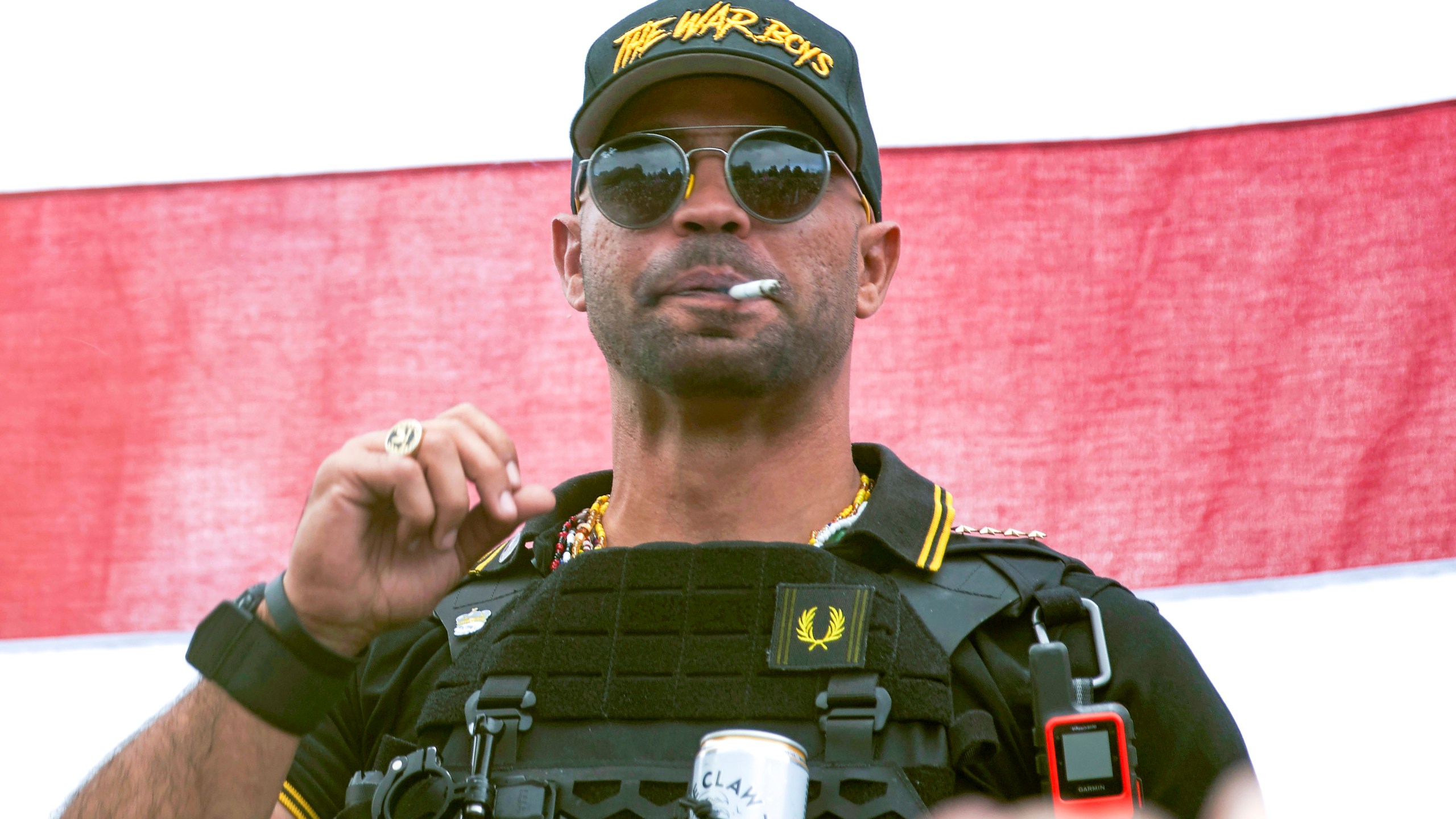 FILE - Proud Boys leader Henry "Enrique" Tarrio wears a hat that says The War Boys during a rally in Portland, Ore., Sept. 26, 2020. Tarrio and three other members of the far-right extremist group have been convicted of a plot to attack the U.S. Capitol in a desperate bid to keep Donald Trump in power after Trump lost the 2020 presidential election. (AP Photo/Allison Dinner, File)