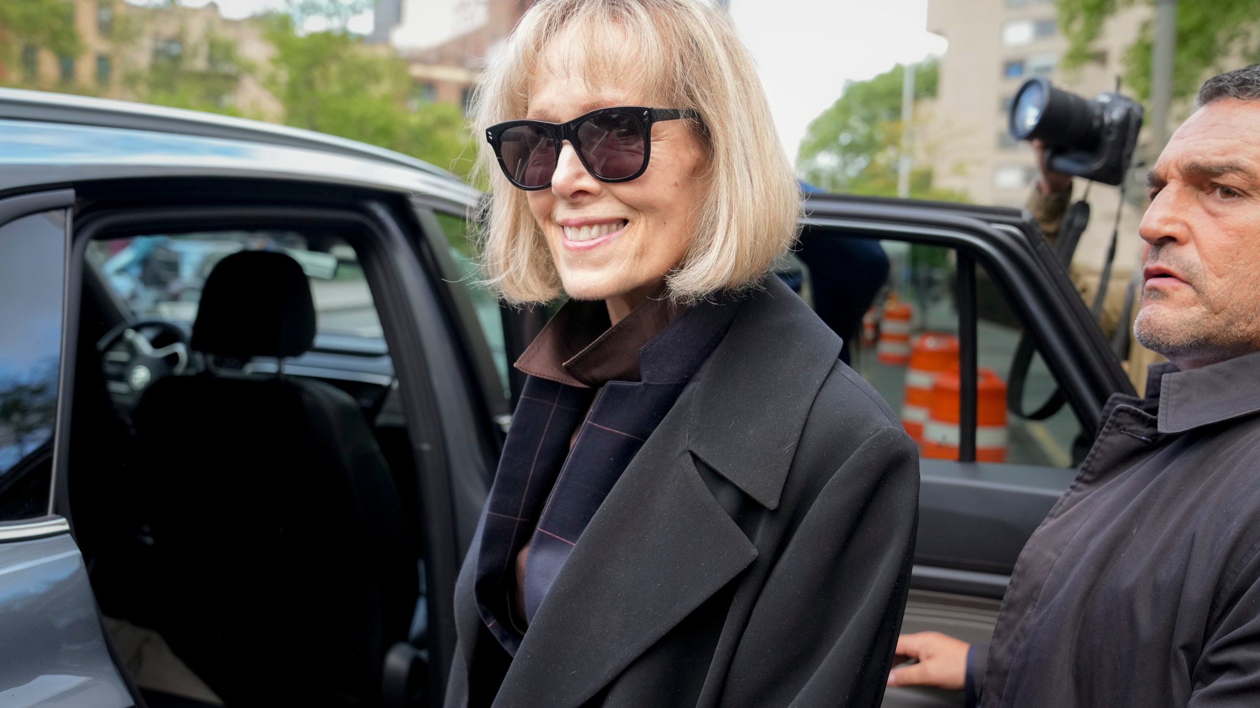 FILE Former advice columnist E. Jean Carroll, left, leaves Manhattan federal court, Thursday, May 4, 2023, in New York. (AP Photo/John Minchillo)