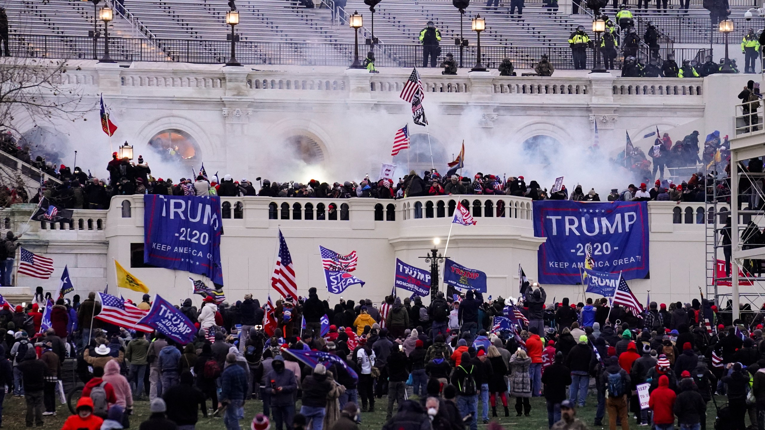 FILE - Violent insurrectionists loyal to President Donald Trump storm the Capitol, Jan. 6, 2021, in Washington. Former Proud Boys leader Enrique Tarrio and three other members of the far-right extremist group have been convicted of a plot to attack the U.S. Capitol in a desperate bid to keep Donald Trump in power after Trump lost the 2020 presidential election. (AP Photo/John Minchillo, File)