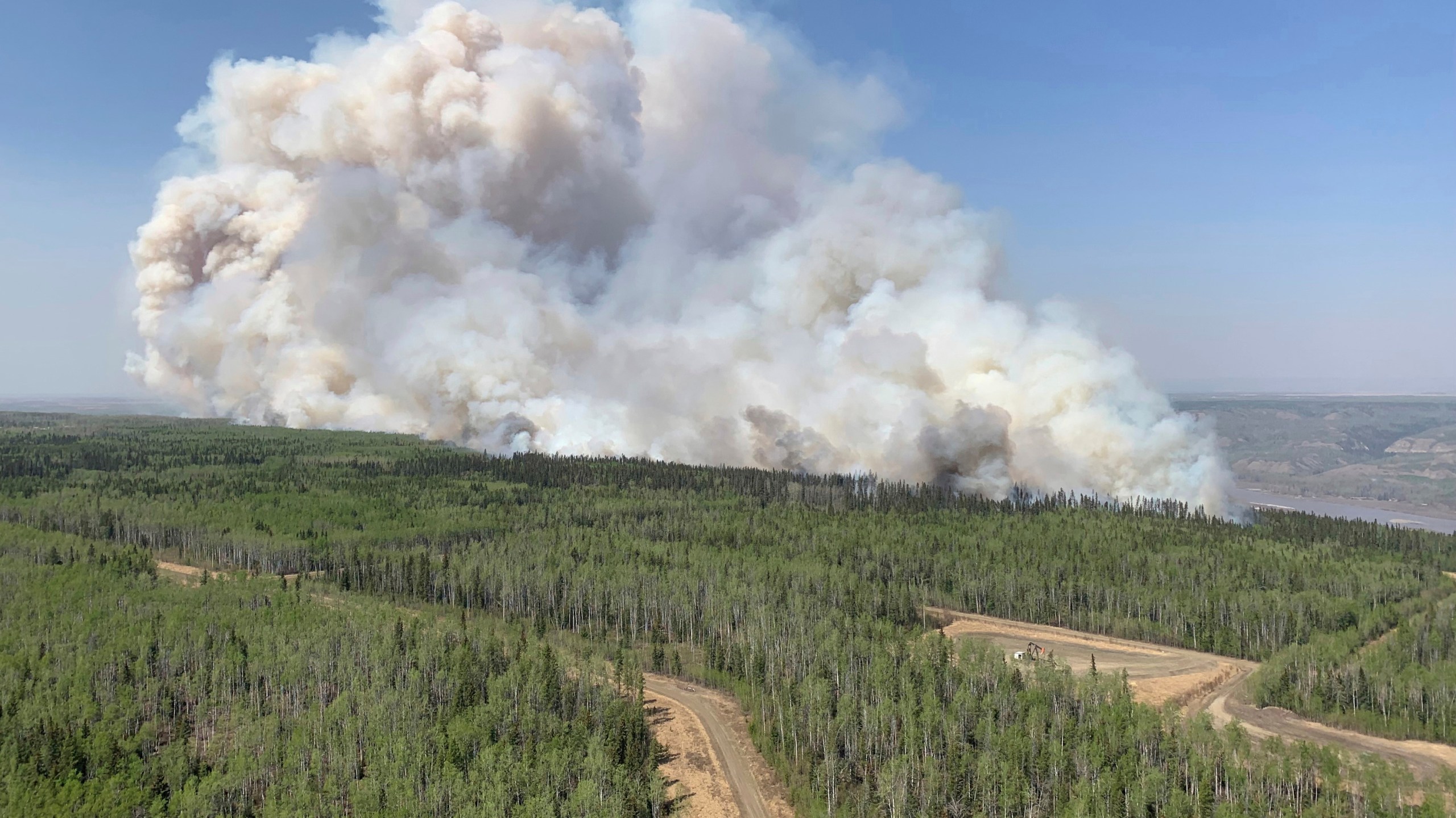 In this photo provided by the Government of Alberta Fire Service, a wildfire burns a section of forest in the Grande Prairie district of Alberta, Canada, Saturday, May 6, 2023. (Government of Alberta Fire Service/The Canadian Press via AP)