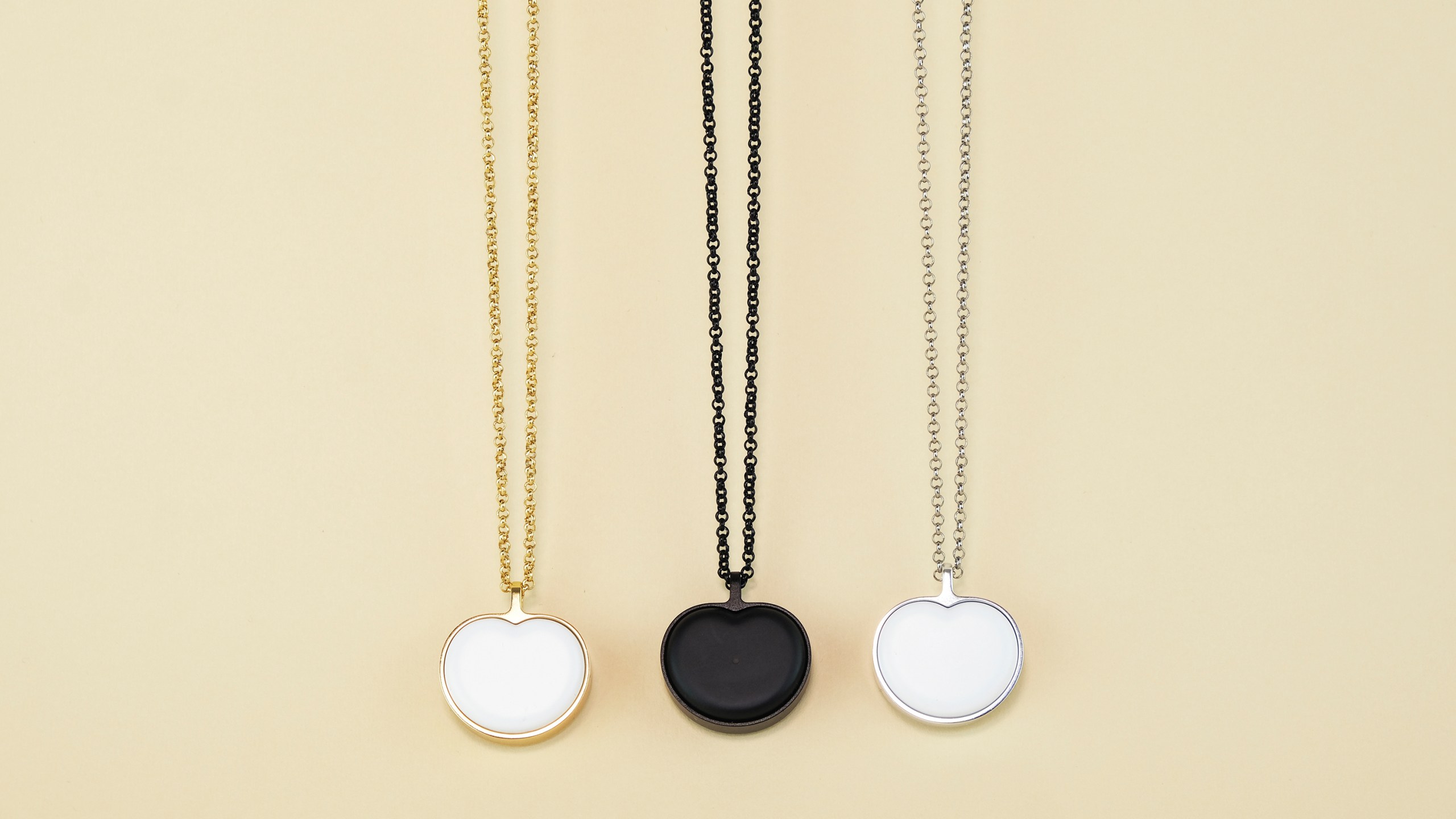 This image provided by Bond-Touch shows the Bond Heart smart necklace, which stores and plays heartbeats with the help of an app. Think outside the box for Mother's Day gifts this year. (Bond-Touch via AP).