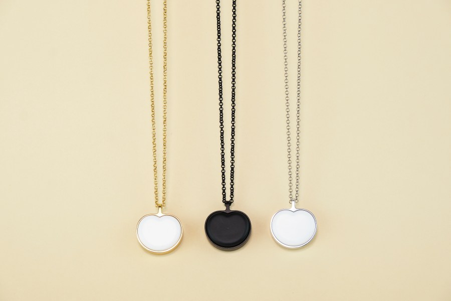 This image provided by Bond-Touch shows the Bond Heart smart necklace, which stores and plays heartbeats with the help of an app. Think outside the box for Mother's Day gifts this year. (Bond-Touch via AP).