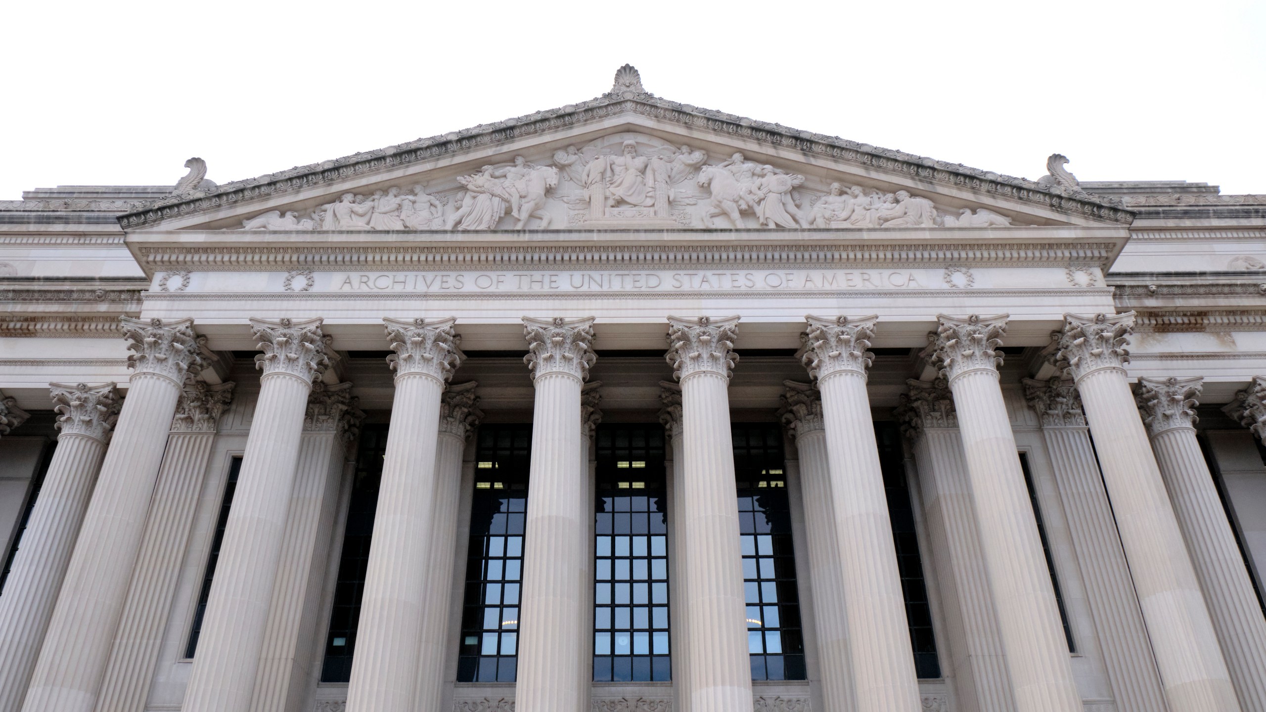 FILE - The north face of the Archives of the United States is seen in this general view March 11, 2019, in Washington. The National Archives has been called more than 80 times in the past decade-plus about classified materials found in the papers of former members of Congress and other U.S. officials, according to newly released congressional testimony. That figure underscores the weaknesses in how the U.S. government tracks and safeguards its most important secrets (AP Photo/Mark Tenally, File)