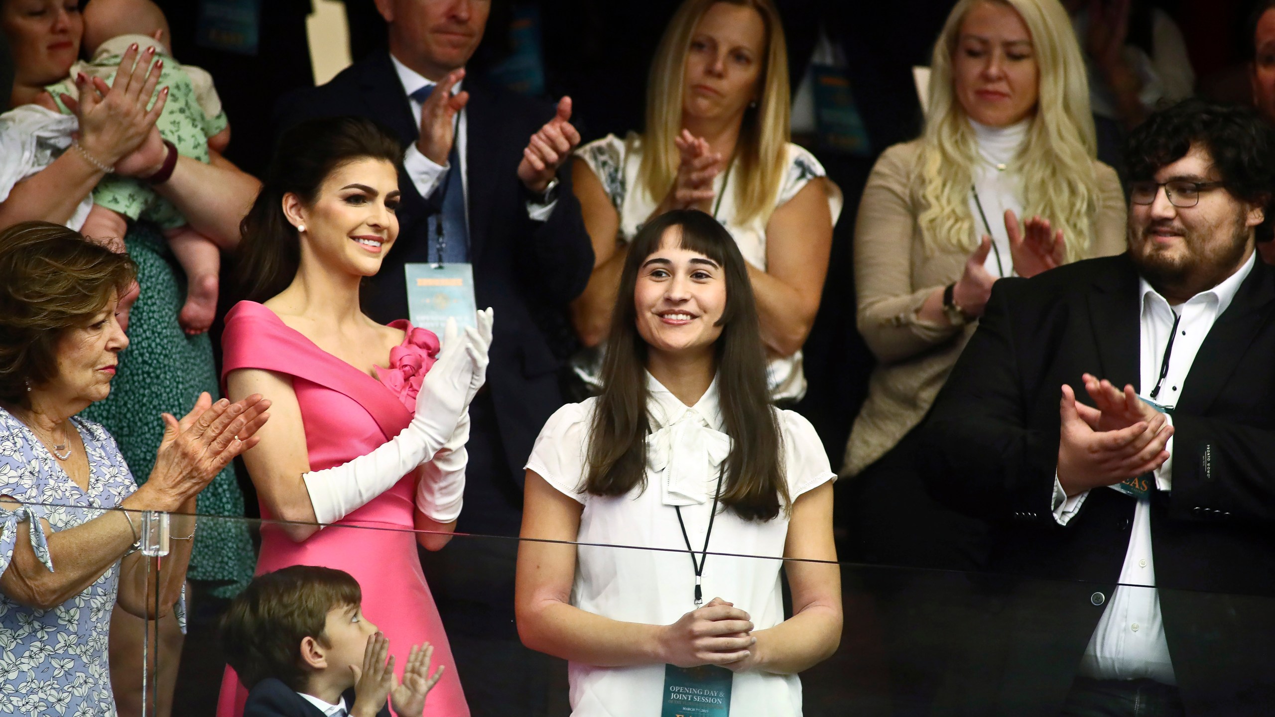 FILE - Chloe Cole, center, is recognized by Florida Gov. Ron DeSantis during a joint session for his State of the State speech Tuesday, Mar. 7, 2023 at the Capitol in Tallahassee, Fla. At left, is Florida first lady Casey DeSantis. Cole received puberty blockers when she was 13, and underwent a double mastectomy at 16. Now she is an advocate against allowing those procedures on children. (AP Photo/Phil Sears, File)