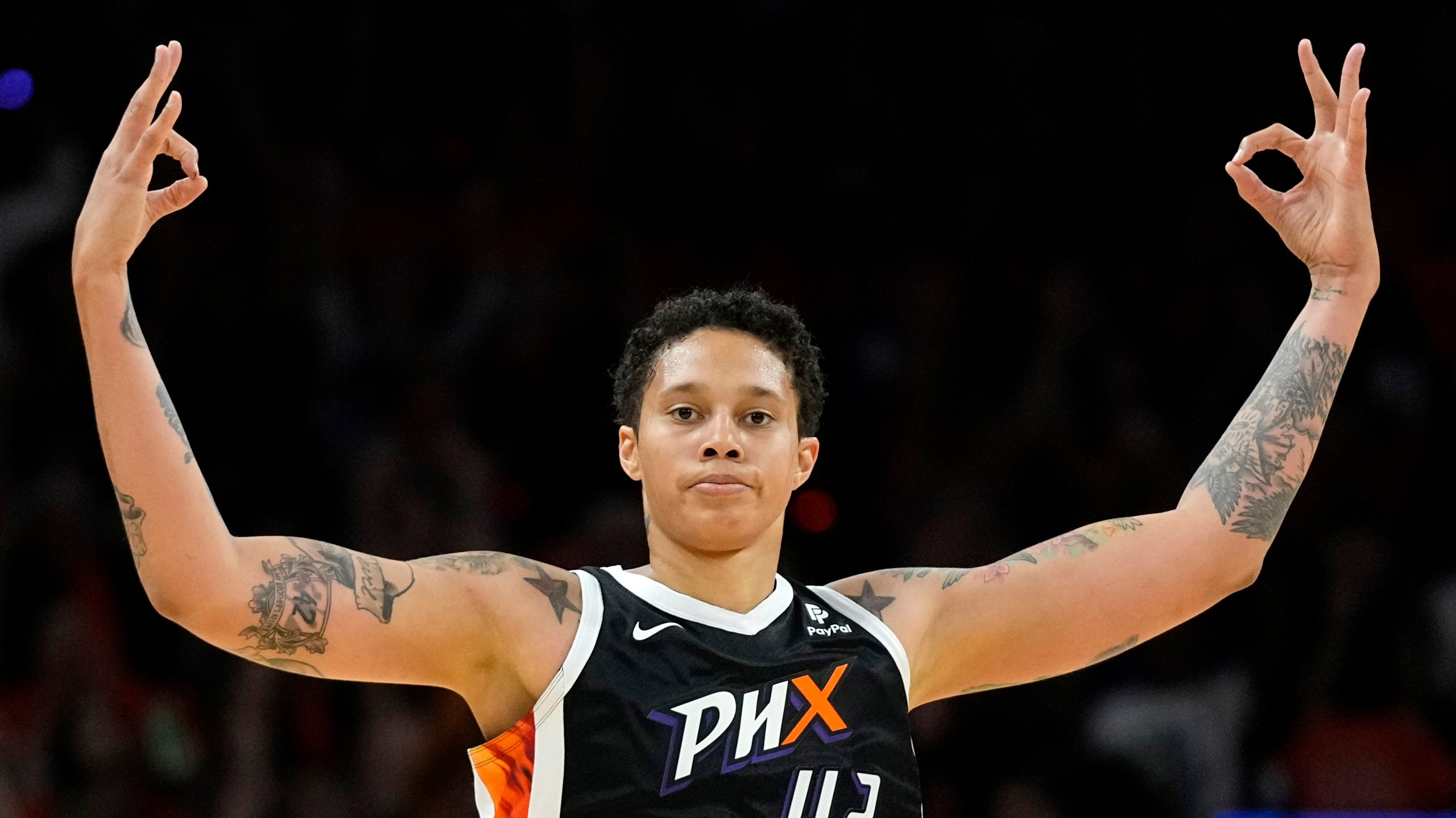 Phoenix Mercury center Brittney Griner (42) celebrates her three-pointer against the Chicago Sky during the second half of a WNBA basketball game, Sunday, May 21, 2023, in Phoenix. (AP Photo/Ross D. Franklin)