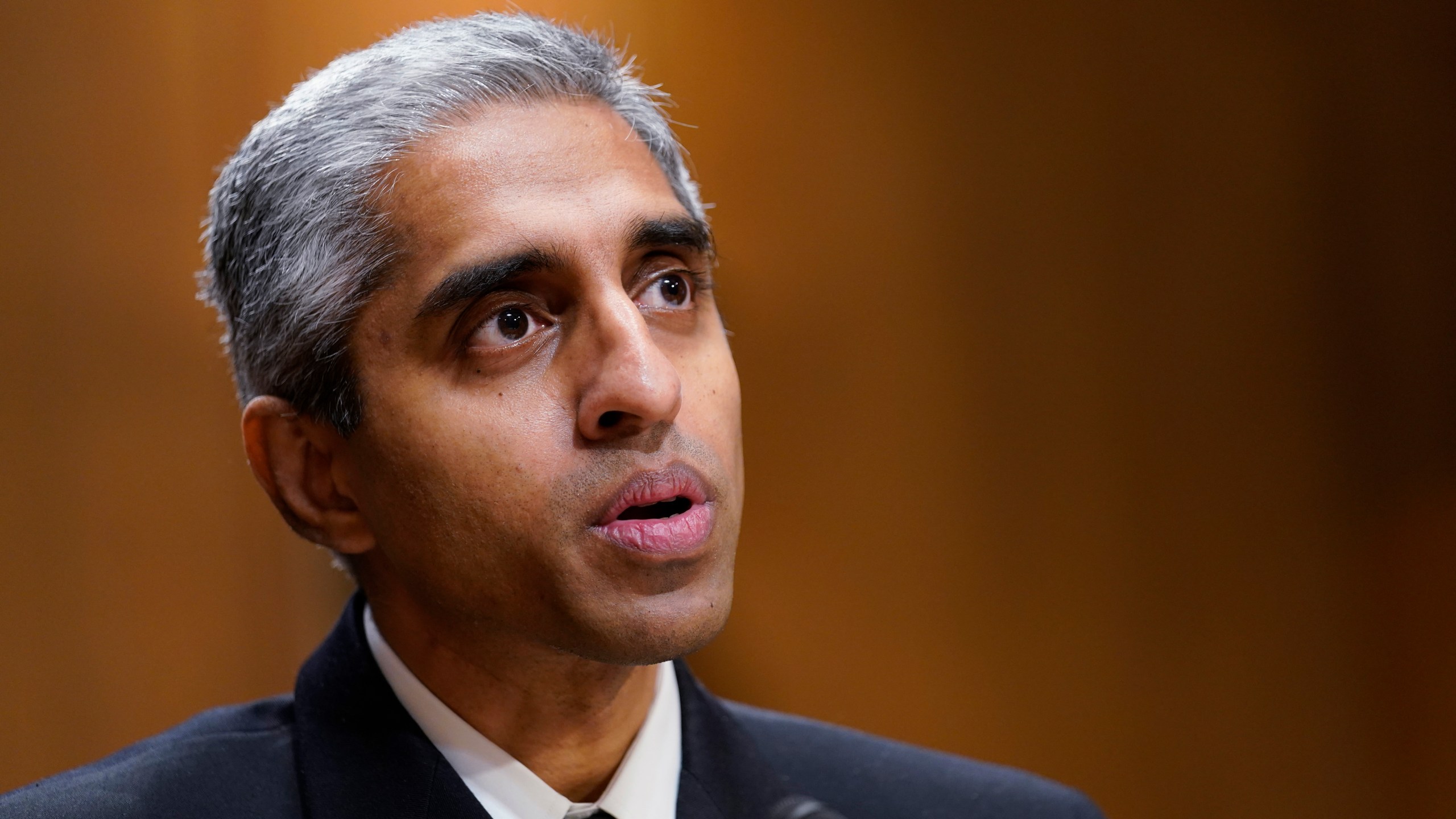 FILE - U.S. Surgeon General Dr. Vivek Murthy testifies before the Senate Finance Committee on Capitol Hill in Washington, on Feb. 8, 2022. The Surgeon General is warning there is not enough evidence to show that social media is safe for young people — and is calling on tech companies, parents and caregivers to take "immediate action to protect kids now." (AP Photo/Susan Walsh, File)