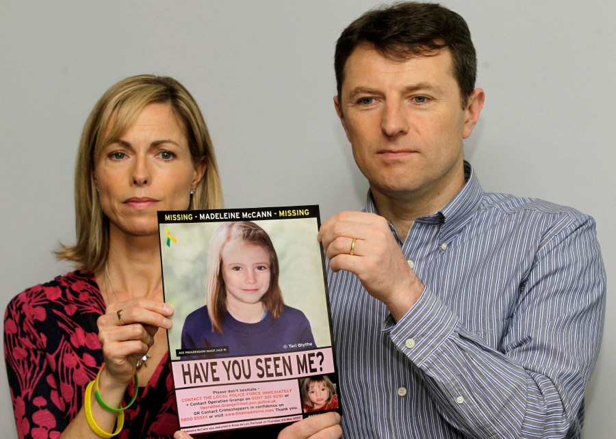 FILE - Kate and Gerry McCann pose for the media with a missing poster depicting an age progression computer generated image of their still missing daughter Madeleine during a news conference in London, May 2, 2012. Portuguese police say they'll resume searching for Madeleine McCann, the British toddler who disappeared in the country’s Algarve region in 2007, in the next few days.Portugal's Judicial Police released a statement confirming local media reports that they would conduct the search at the request of the German authorities and in the presence of British officials. (AP Photo/Sang Tan, File)