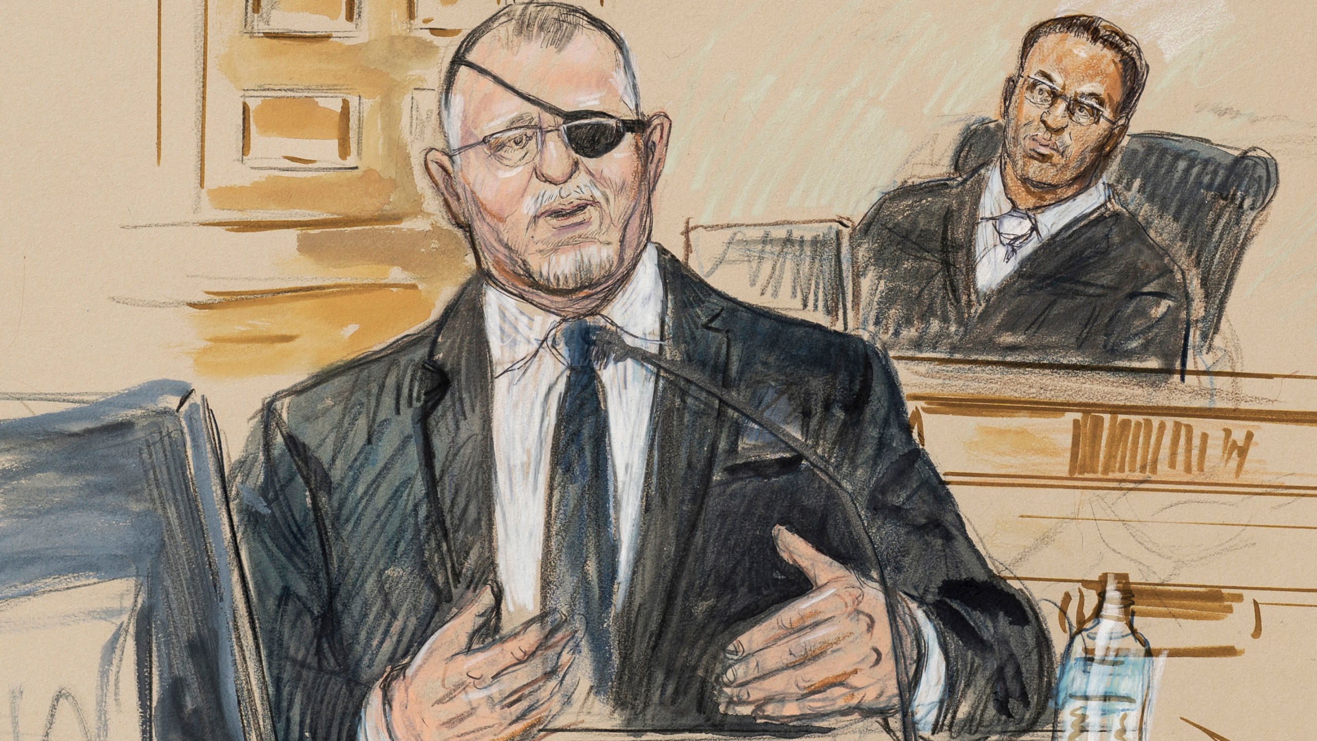 FILE - This artist sketch depicts the trial of Oath Keepers leader Stewart Rhodes, left, as he testifies before U.S. District Judge Amit Mehta on charges of seditious conspiracy in the Jan. 6, 2021, attack on the U.S. Capitol, in Washington, Nov. 7, 2022. Rhodes and members of his antigovernment group will be the first Jan. 6 defendants sentenced for seditious conspiracy in a series of hearings beginning this week that will set the standard for more punishments of far-right extremists to follow. (Dana Verkouteren via AP, File)