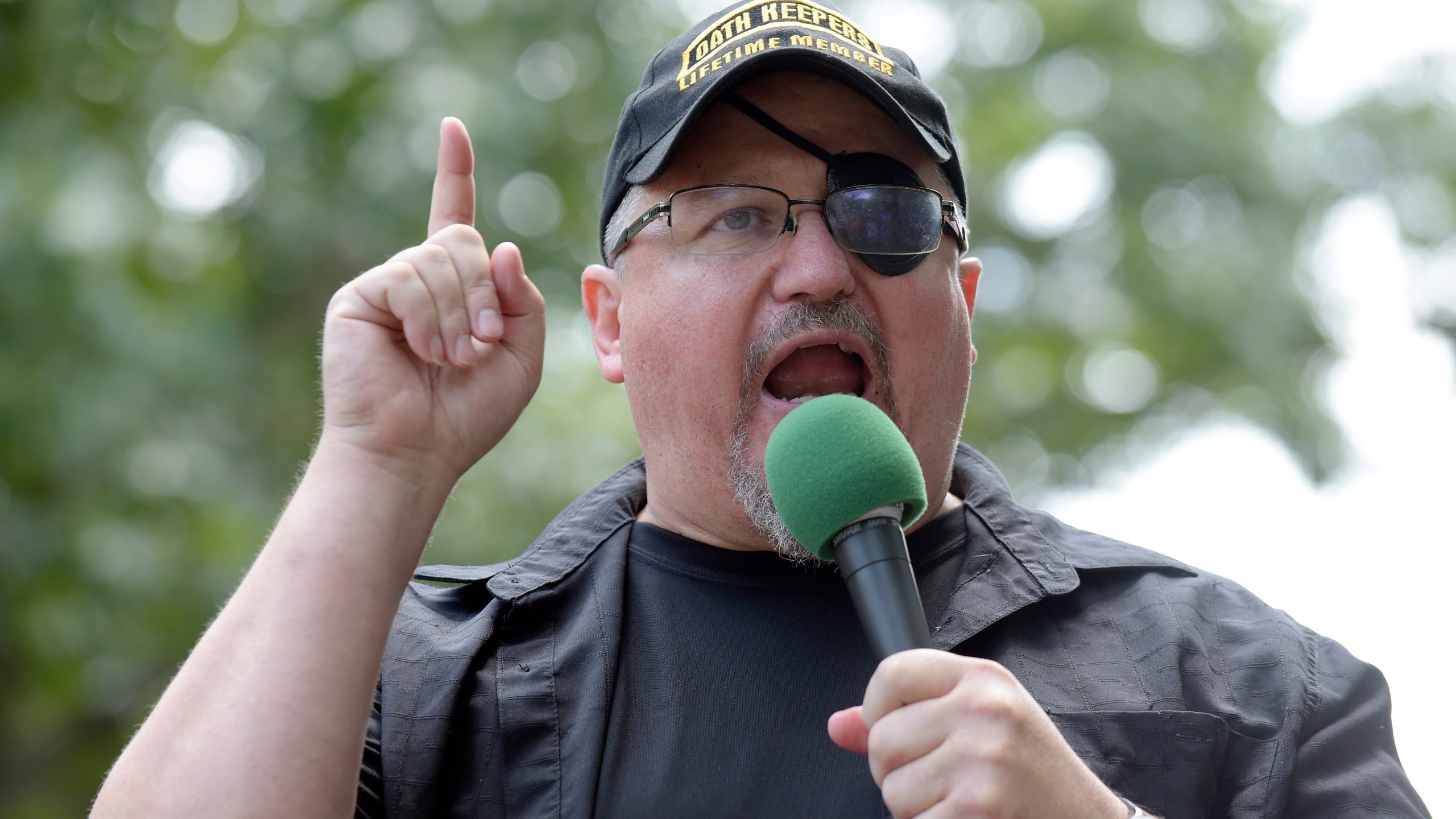 FILE - Stewart Rhodes, founder of the Oath Keepers, speaks during a rally outside the White House in Washington, June 25, 2017. Rhodes has been sentenced to 18 years in prison for seditious conspiracy in the Jan. 6, 2021, attack on the U.S. Capitol. He was sentenced Thursday after a landmark verdict convicting him of spearheading a weekslong plot to keep former President Donald Trump in power. (AP Photo/Susan Walsh, File)