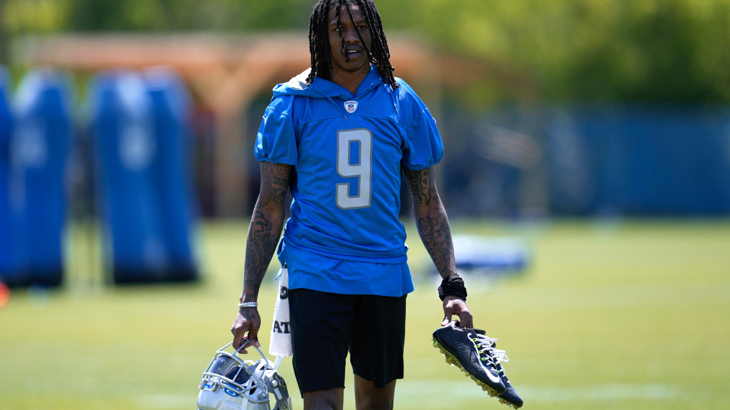 Detroit Lions wide receiver Jameson Williams (9) walks off the field after an NFL football practice in Allen Park, Mich., Thursday, May 25, 2023. (AP Photo/Paul Sancya)