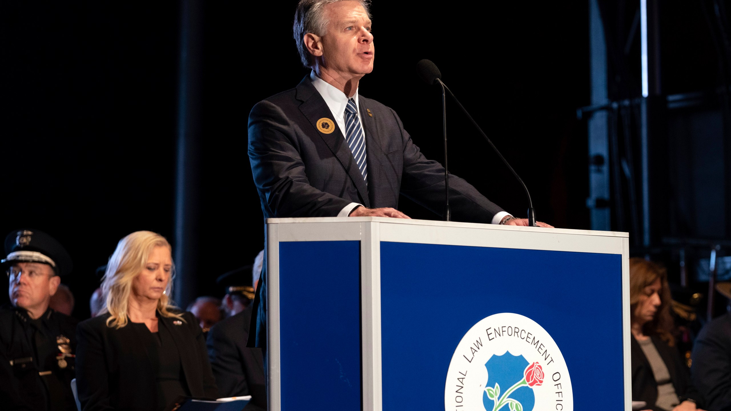 FBI Director Christopher Wray speaks during the 35th Annual Candlelight Vigil to honor the law enforcement officers who lost their lives in 2022, during the National Police Week at the National Mall in Washington, Saturday, May 13, 2023. (AP Photo/Jose Luis Magana)