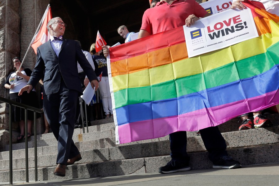 FILE - Jim Obergefell, the named plaintiff in the Obergefell v. Hodges Supreme Court case that legalized same sex marriage nationwide, arrives for a news conference on the steps of the Texas Capitol, June 29, 2015, in Austin, Texas. The start of June marks the beginning of Pride month around the U.S. and some parts of the world, celebrating the lives and experiences of LGBTQ+ communities as well as raising awareness about ongoing struggles and pushing back against efforts to roll back civil rights gains that have been made. (AP Photo/Eric Gay, File)