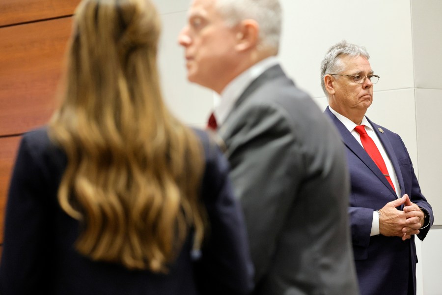 Former Marjory Stoneman Douglas High School School Resource Officer Scot Peterson, right, is shown prior to opening statements in his trial at the Broward County Courthouse in Fort Lauderdale on Wednesday, June 7, 2023. Assistant State Attorneys Kristen Gomes and Steven Klinger are shown at left. (Amy Beth Bennett/South Florida Sun-Sentinel via AP, Pool)