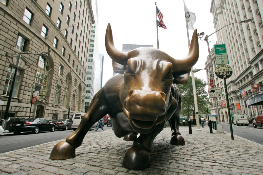 FILE- This Oct. 18, 2008 file photo shows the Charging Bull sculpture in New York City's Financial District. The S&P 500 is now in what Wall Street refers to as a bull market, meaning the index has risen 20% or more from its most recent low. (AP Photo/Mary Altaffer, File)