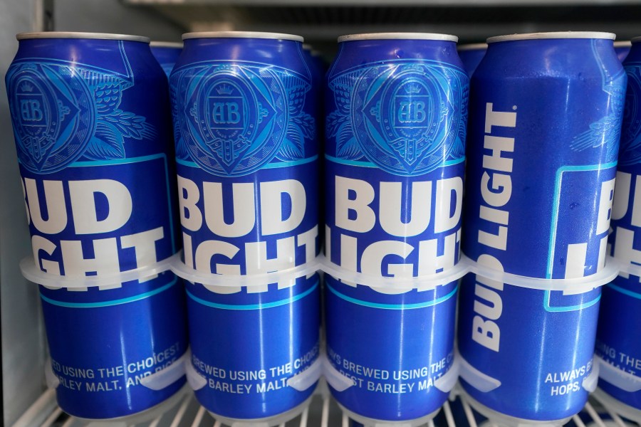 Cans of Bud Light chill in a refrigerator in Oakland, Calif., Friday, April 28, 2023. After more than two decades as America's best-selling beer, Bud Light has slipped into second place. Modelo Especial, a Mexican lager, overtook Bud Light in U.S. retail dollar sales in the month ending June 3. (AP Photo/Jeff Chiu)