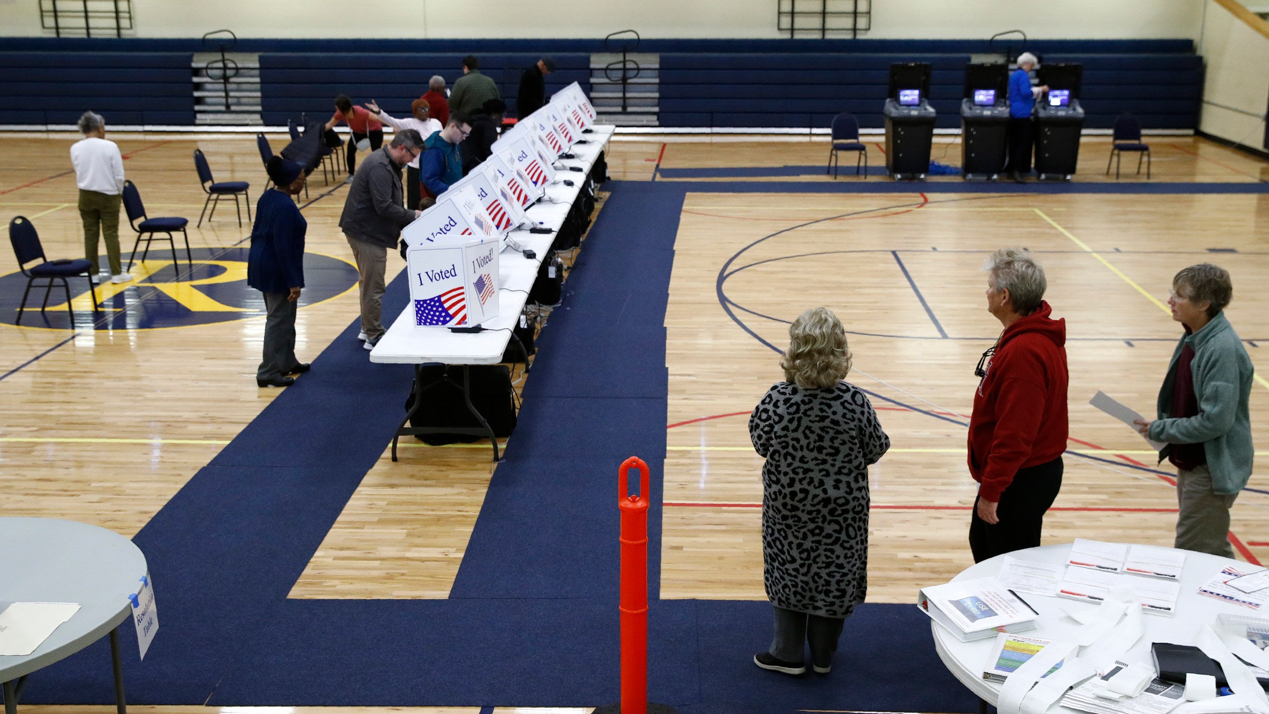 FILE - Voters fill out their ballots at a primary polling place, Feb. 29, 2020, in North Charleston, S.C. South Carolina Republicans have set Feb. 24 as the date of their 2024 presidential primary, a move that, if approved, the party says will give GOP White House hopefuls more time to campaign in the first-in-the-South state. (AP Photo/Patrick Semansky, File)