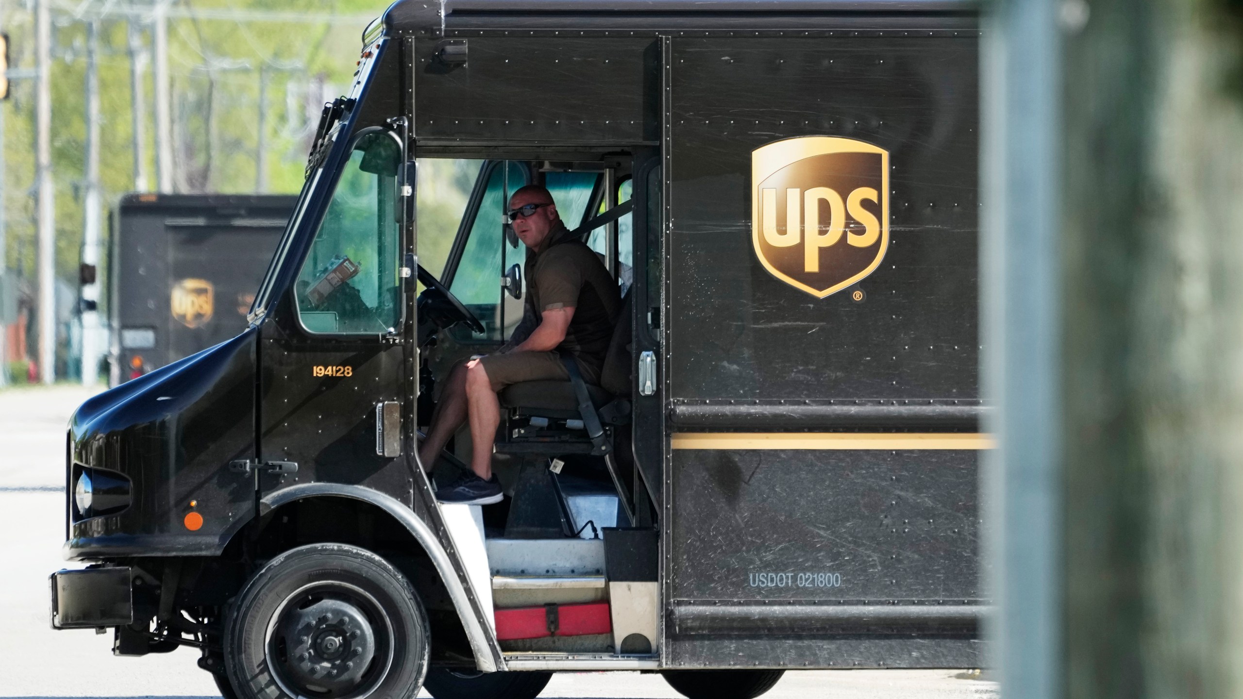 File - A UPS truck makes deliveries in Northbrook, Ill., Wednesday, May 10, 2023. Frustrated by what he called an "appalling counterproposal" earlier this week, the head of the union representing 340,000 UPS workers said a strike now appears inevitable and gave the shipping giant a Friday deadline to improve its offer. (AP Photo/Nam Y. Huh)