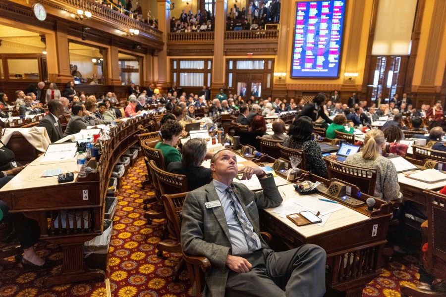 FILE - A view of the House of Representatives in Atlanta, following the passage of SB 140 on Thursday, March 16, 2023. SB 140 limits treatment for transgender youth. Lawyers for parents of four transgender children said they have filed a lawsuit challenging a Georgia law that bans most gender-affirming surgeries and hormone replacement therapies for transgender people under 18. The law is set to take effect Saturday, July 1. (Arvin Temkar/Atlanta Journal-Constitution via AP, File)