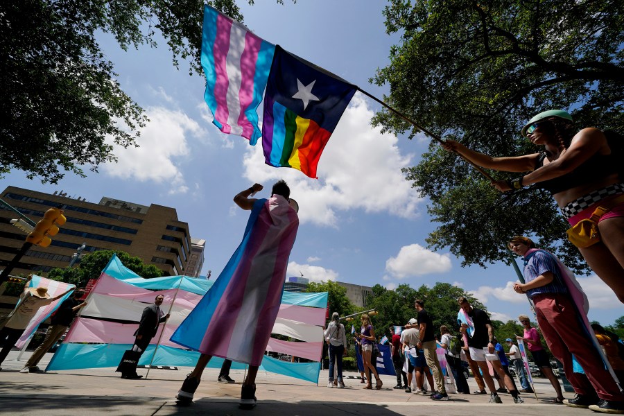 FILE - Demonstrators gather on the steps to the State Capitol to speak against transgender-related legislation bills being considered in the Texas Senate and House, May 20, 2021, in Austin, Texas. The U.S. Supreme Court on Friday, June 30, 2023, said it will not review a first-of-its-kind ruling from a federal appeals court that found people with gender dysphoria are entitled to the protections of the Americans With Disabilities Act. (AP Photo/Eric Gay, File)