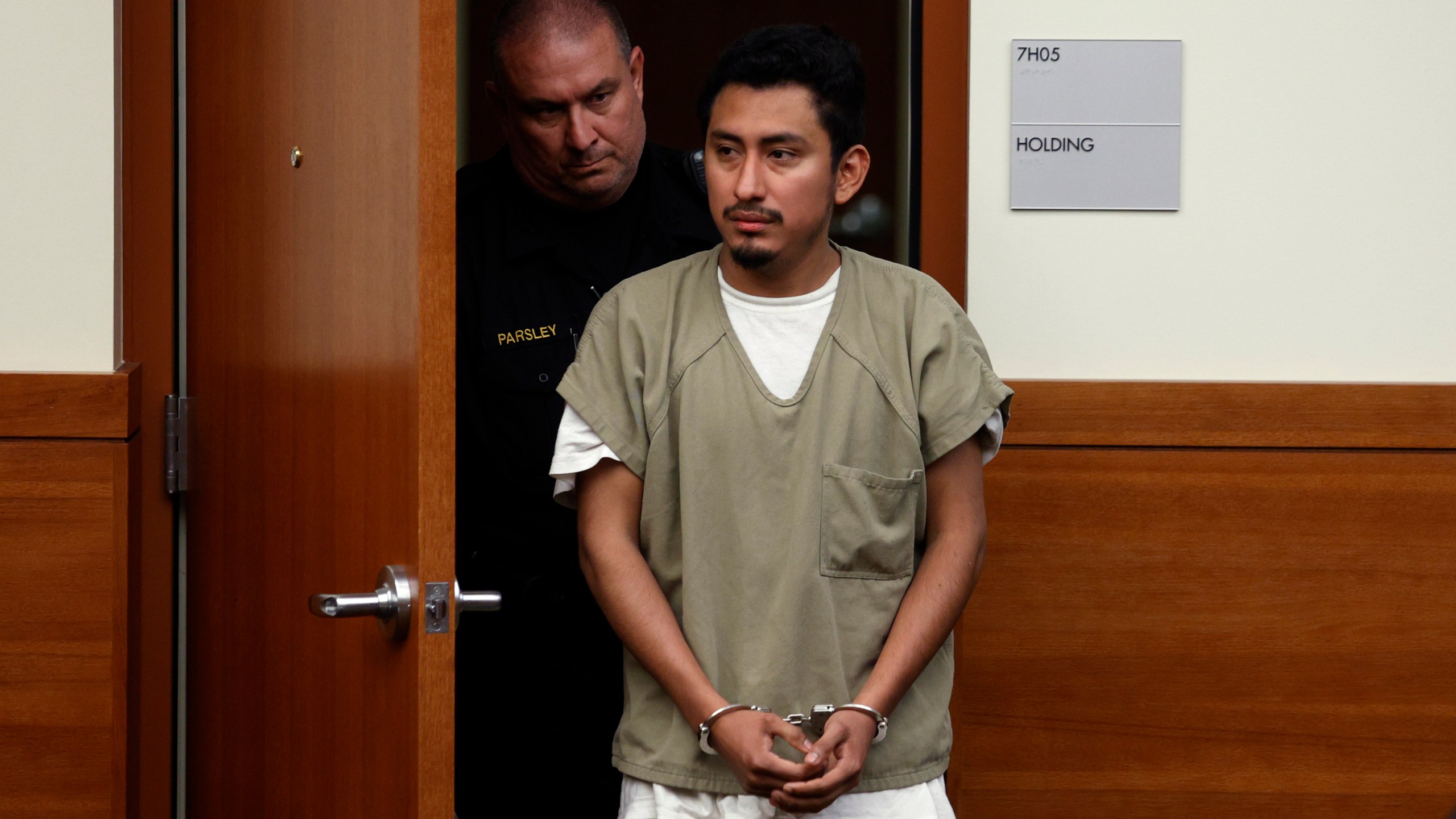 FILE - Gerson Fuentes, right, the man accused of raping and impregnating a 9-year-old Ohio girl, who at 10 had to travel to Indiana for an abortion, enters Franklin County common pleas court in Columbus, Ohio, for his bond hearing, July 28, 2022. On Wednesday, July 5, 2023, Fuentes pleaded guilty to two counts of rape. He was sentenced to life in prison but, as part of his plea deal, will be eligible to seek probation after serving 25 to 30 years. He will also have to register as a sex offender. (AP Photo/Paul Vernon, File)