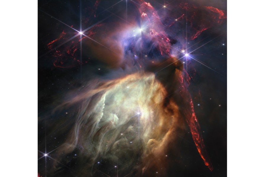 The first anniversary image released Wednesday, July 12, 2023, by Space Telescope Science Institute Office of Public Outreach, shows NASA’s James Webb Space Telescope displaying a star birth like it’s never been seen before, full of detailed, impressionistic texture. The subject is the Rho Ophiuchi cloud complex, the closest star-forming region to Earth. (NASA, ESA, CSA, STScI, Klaus Pon via AP)