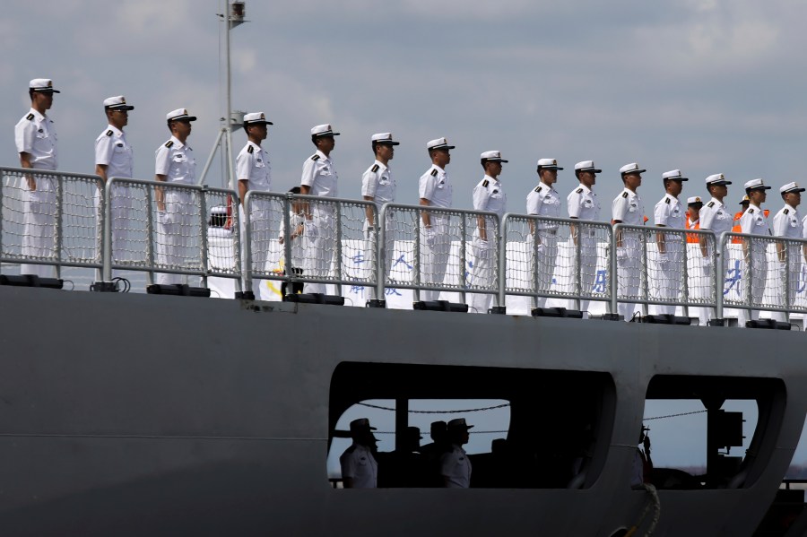 FILE - Chinese navy sailors stand in formation on board the naval training ship, Qi Jiguang, as it docks at Manila's port, Philippines Wednesday, June 14, 2023. China says it's navy ships are preparing for joint exercises with Russia's sea forces in a sign of Beijing's continuing support for Moscow's invasion of neighboring Ukraine. (AP Photo/Basilio Sepe, File)