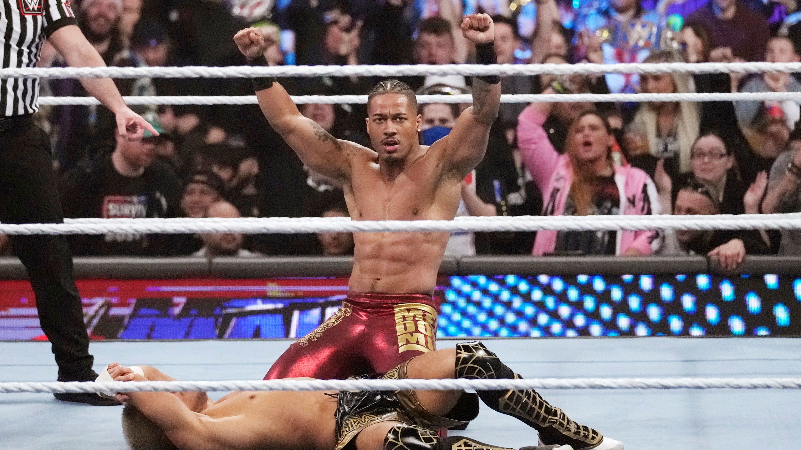 FILE - Wrestler Carmelo Hayes raises his arms after defeating Akira Tozawa during the WWE Monday Night RAW event, Monday, March 6, 2023, in Boston. Federal law enforcement agents executed a search warrant and served a federal grand jury subpoena to WWE Executive Chairman Vince McMahon last month, July 2023, according to a regulatory filing. McMahon is also taking medical leave from the sports entertainment company following recent spinal surgery. (AP Photo/Charles Krupa, File)