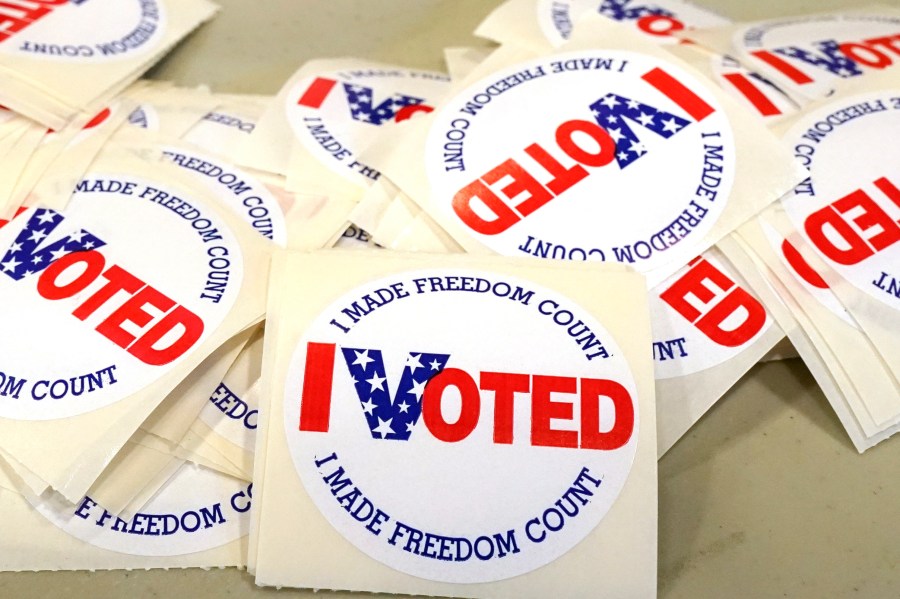 FILE - "I Voted" stickers are ready to be distributed to each person who filled out their ballot, Tuesday, Nov. 8, 2022, at a Brandon, Miss., precinct. Mississippi is violating the U.S. Constitution's ban on cruel and unusual punishment by permanently stripping voting rights from people convicted of some felonies, a federal appeals court panel ruled in a split decision Friday, Aug. 4, 2023. (AP Photo/Rogelio V. Solis, File)