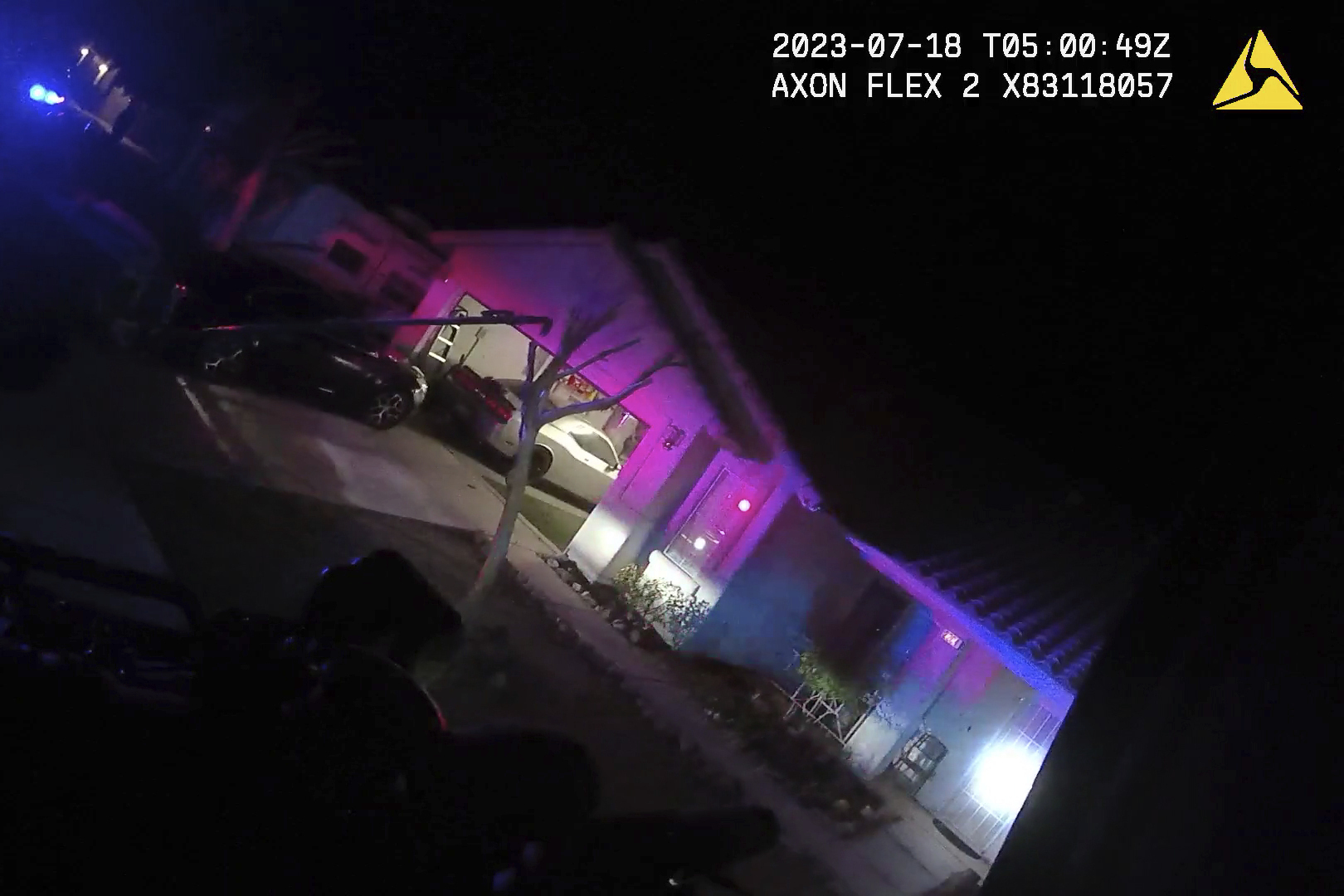 This Monday evening, July 17, 2023 image taken from police body camera video provided by the Las Vegas Metropolitan Police Department, shows a home SWAT officers raided in the nearby city of Henderson, Nev., in connection with the 1997 killing of rapper Tupac Shakur near the Las Vegas Strip. (Las Vegas Metropolitan Police Department via AP)