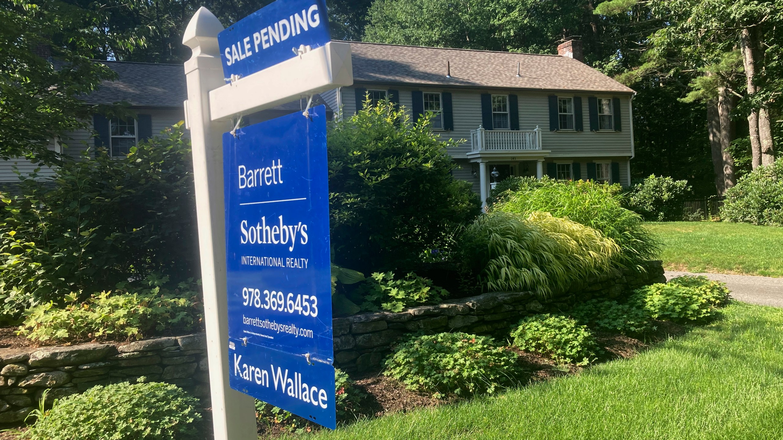 A sign noting a pending sale is shown in front of a home on Sunday, Aug. 20, 2023, in Concord, Mass. On Tuesday, Aug. 22, 2023, the National Association of Realtors reports on sales of existing homes in July. (AP Photo/Peter Morgan)