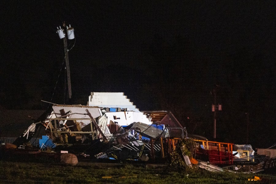 Damage to a structure is left after a strong storm passed in Kent County, Michigan on Thursday, Aug. 24, 2023. A strong storm powered by winds up to 75 mph has downed trees and power lines across Michigan, torn roofs off buildings and left hundreds of thousands of customers without power. (Joel Bissell/Kalamazoo Gazette via AP)