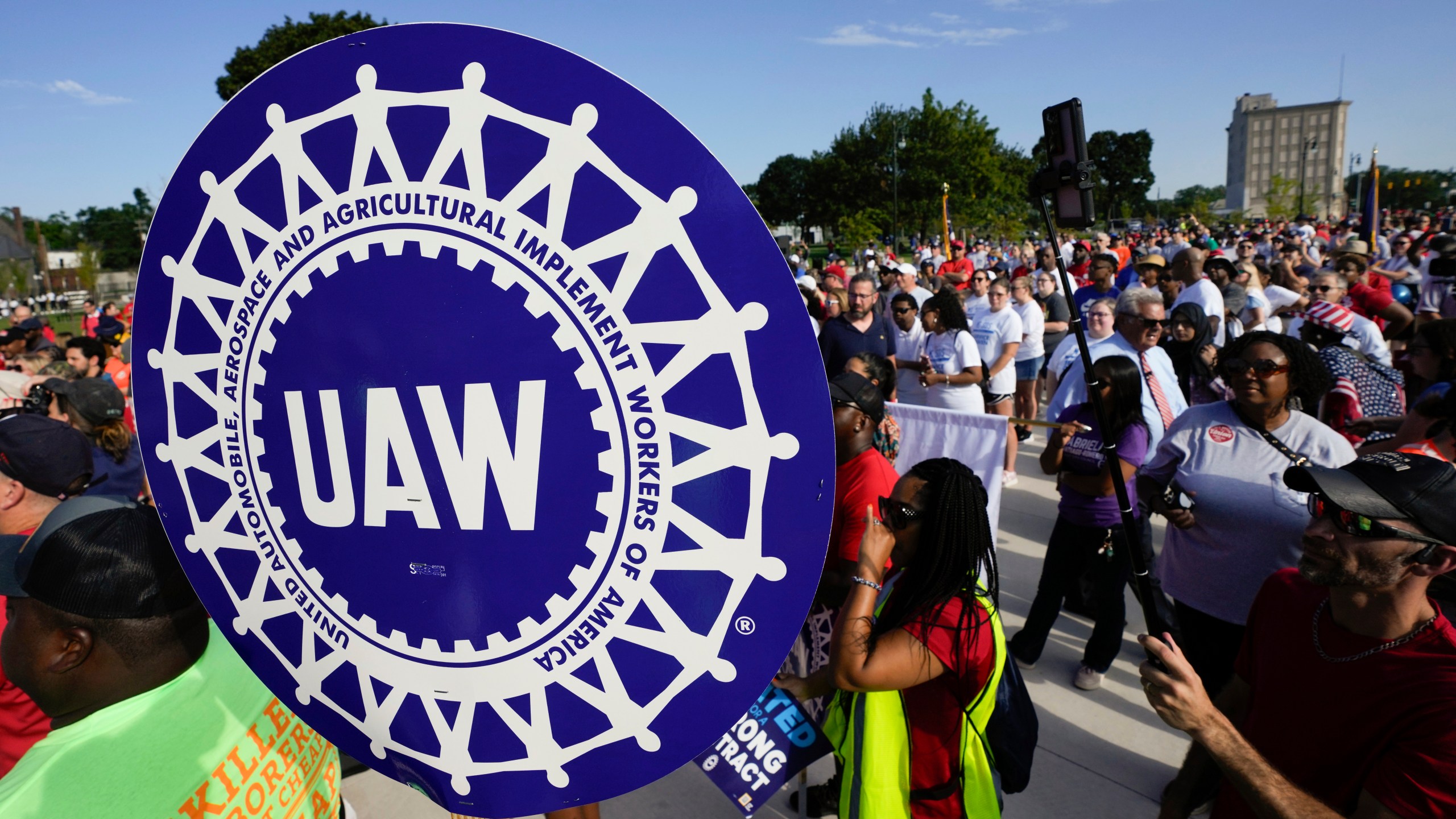 United Auto Workers members walk in the Labor Day parade in Detroit, Monday, Sept. 4, 2023. (AP Photo/Paul Sancya)