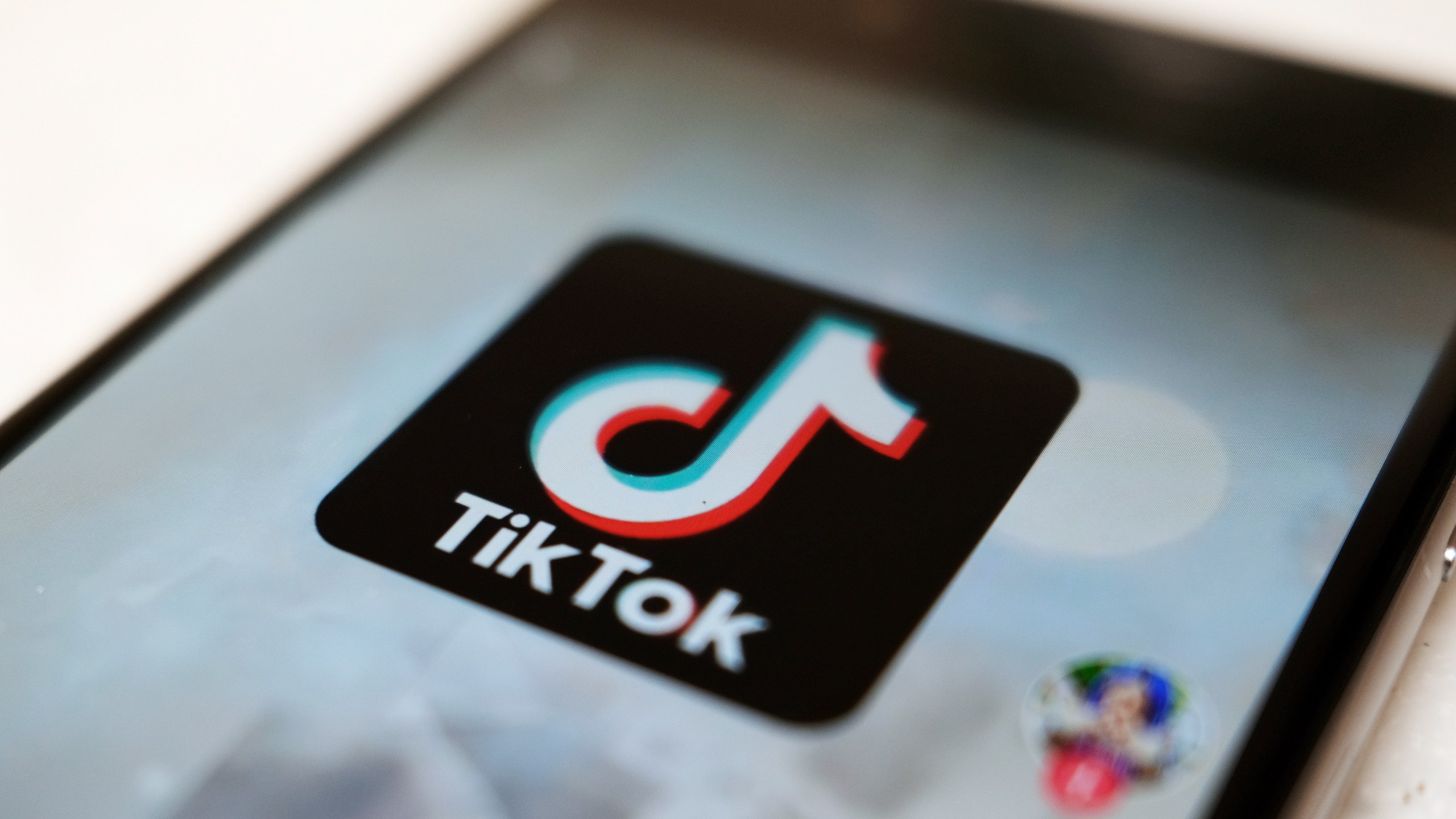 FILE - This Sept. 28, 2020, file photo, shows a TikTok logo on a smartphone screen in Tokyo. After months of testing, TikTok is fully launching its e-commerce product in the U.S., in an effort to translate the app’s cultural relevance among young consumers to sales. The company said Tuesday, Sept. 12, 2023 its shopping wing, called TikTok Shop, will include several features such as a “Shop Tab,” a marketplace its been testing on the app since August. (AP Photo/Kiichiro Sato, File)